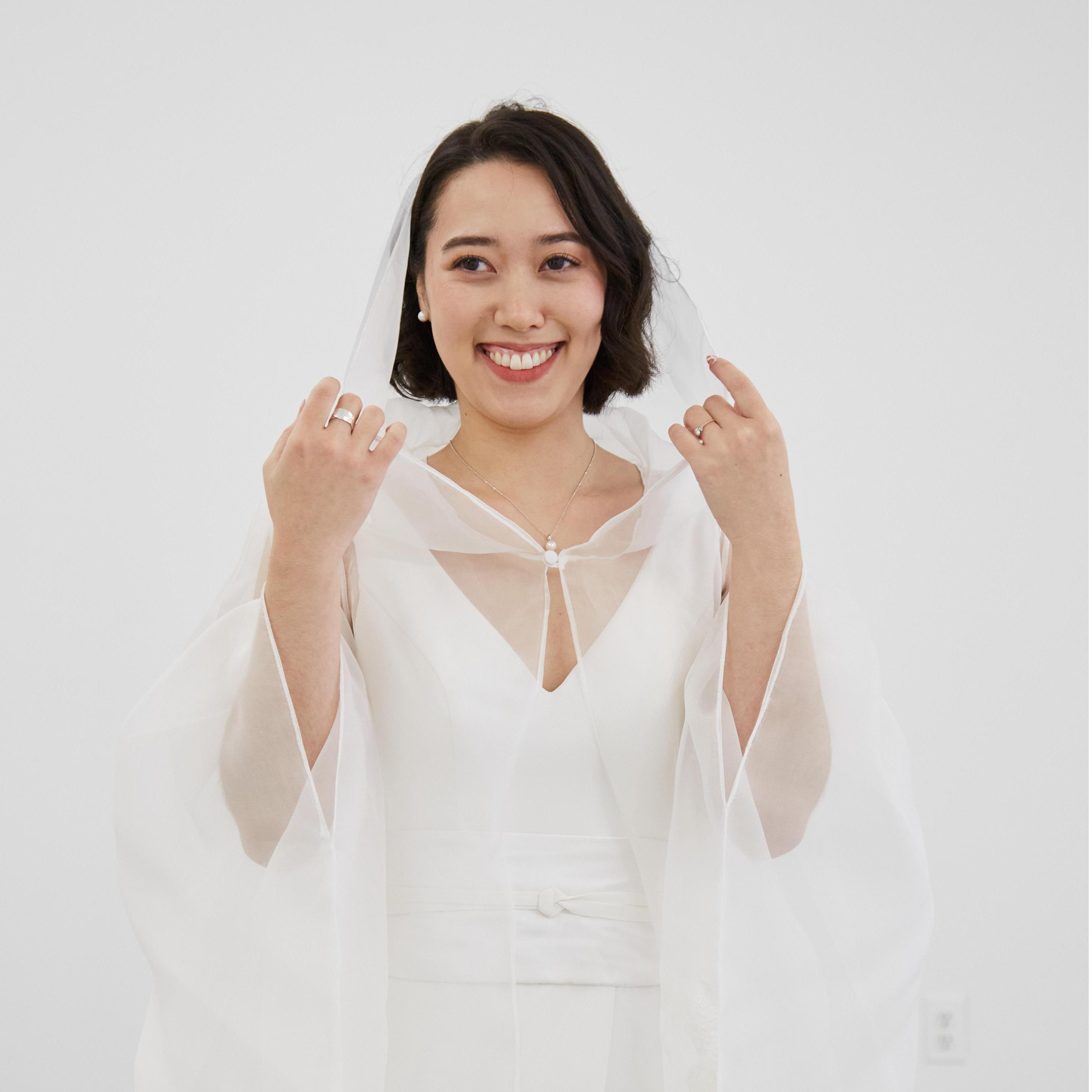 The wedding dress: inspired by the traditional Japanese wedding attire called the shiro-muku, with a western twist!
