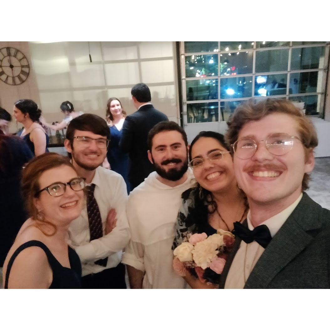 Katy, John, Br. Joseph Thomas (left to right) at Andrew and Ana Babb-Henriquez's wedding