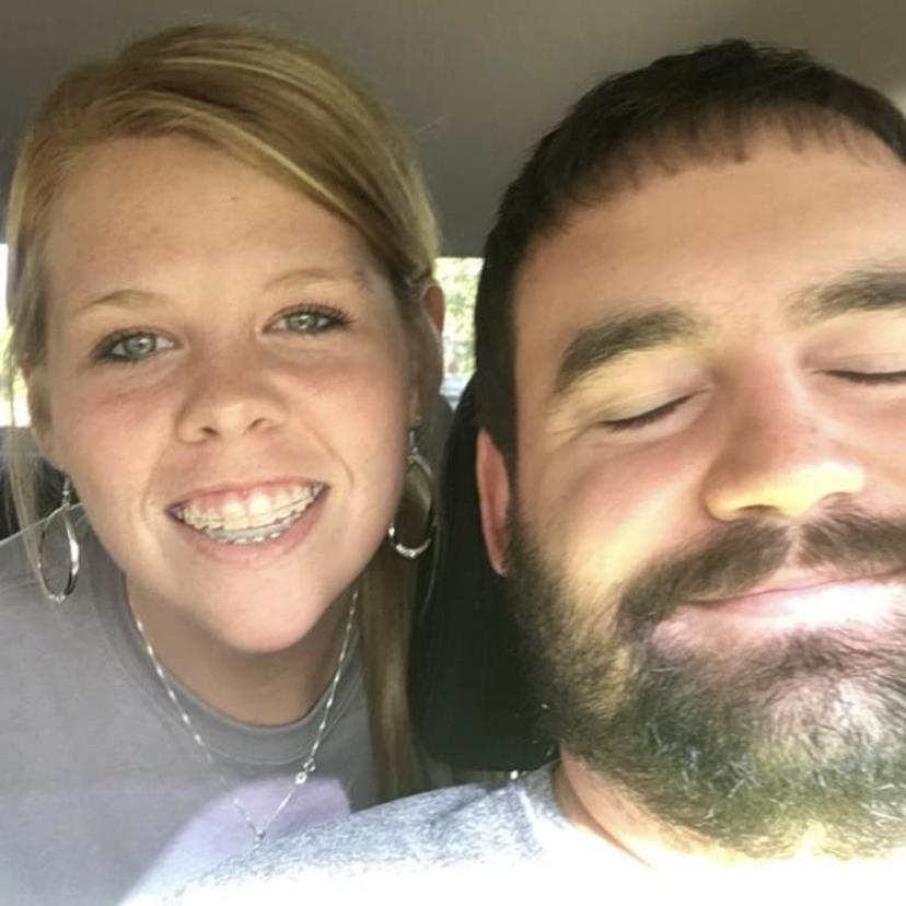 The groom was in the driver seat… no one was harmed in the taking of this photo.