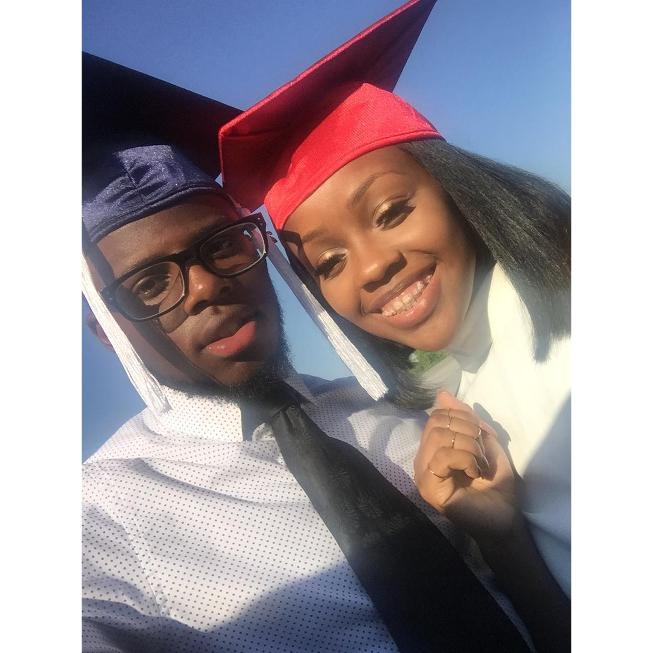 Before walking the stage. Both in the top 10% of our class.