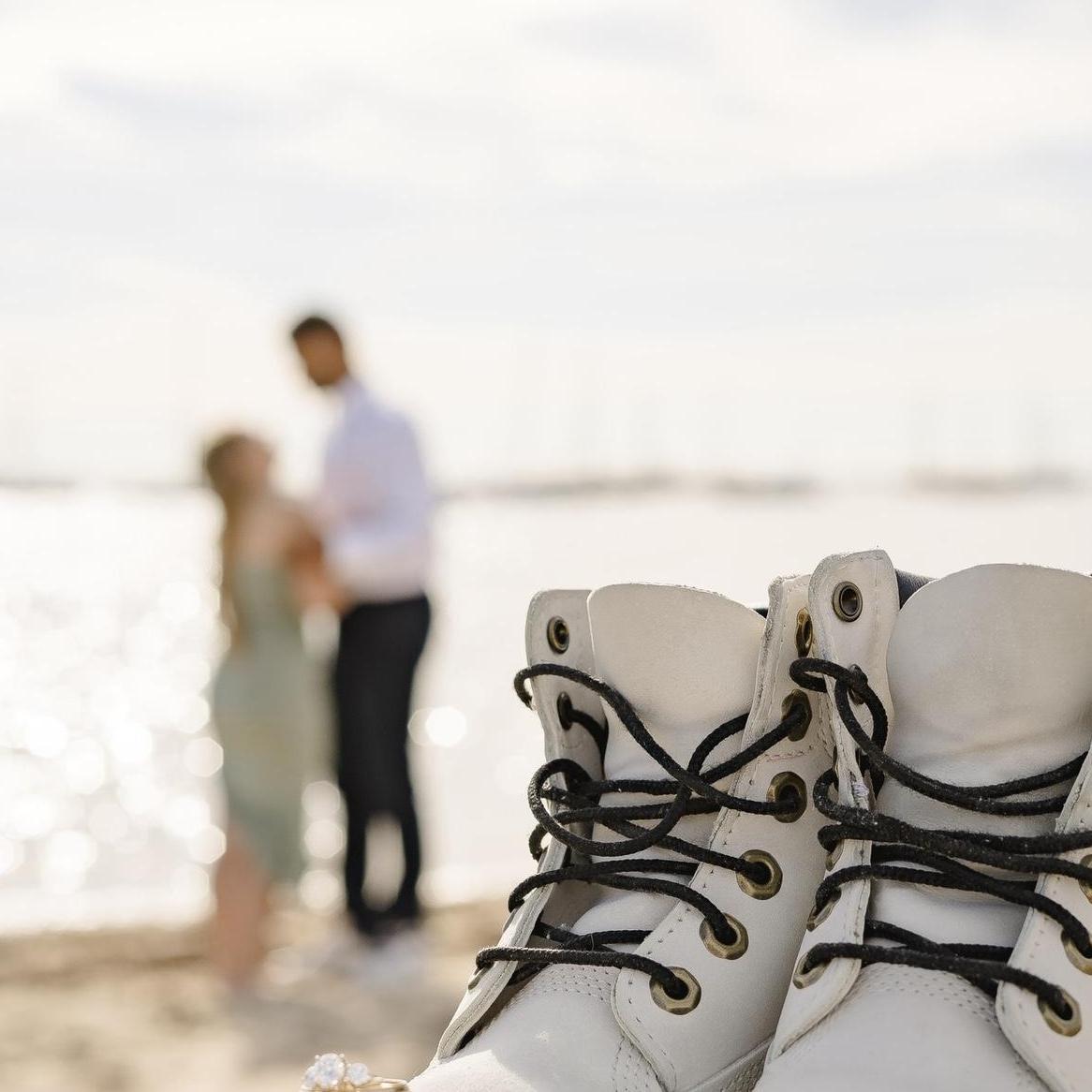 One of our many engagement photos, taken by Elizabeth Clark.
The scene perfectly captures our closeness & love for one another. While also depicting our island ties & strong work ethic (Timberlands).