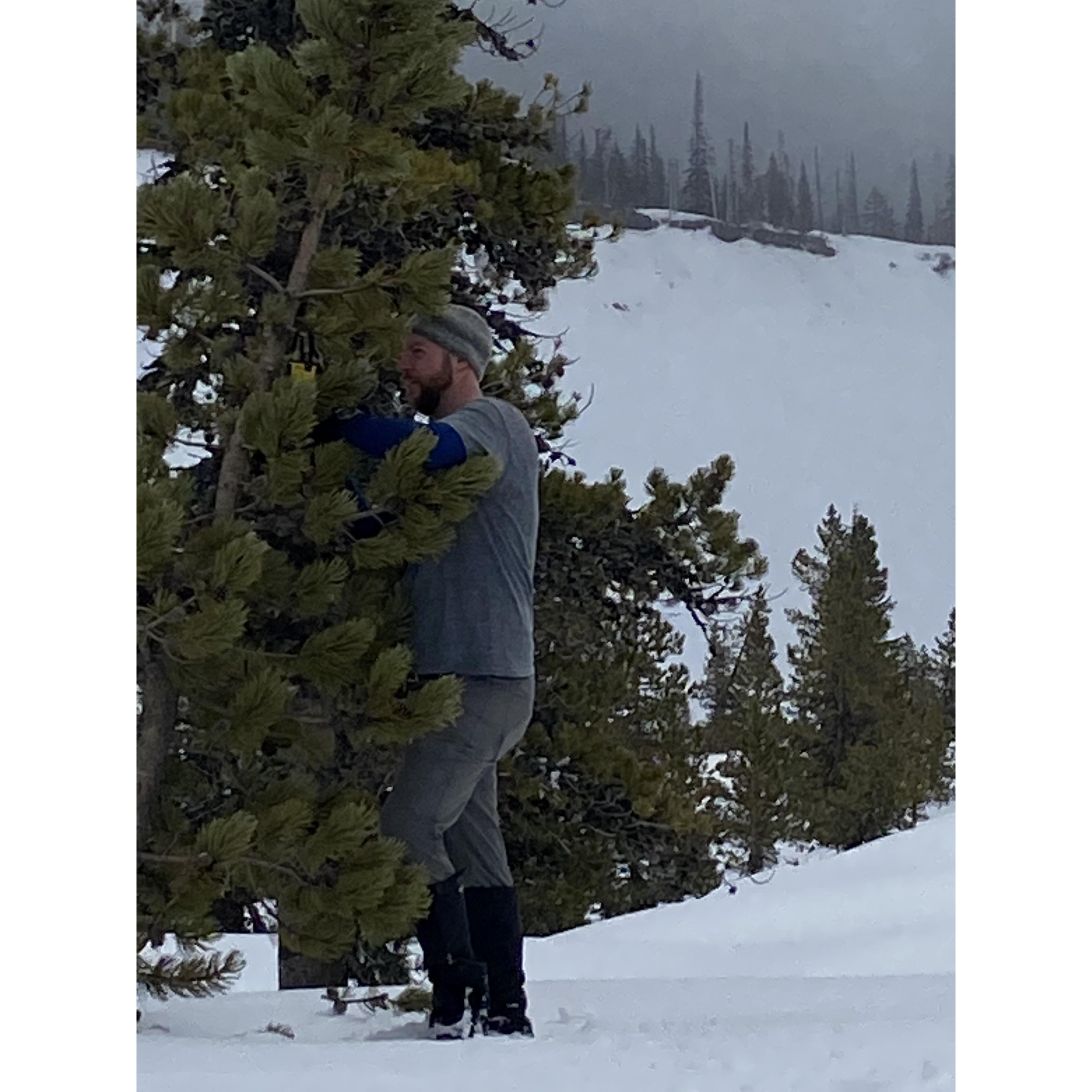 Brandon setting up the camera to video the engagement. Not suspicious at all.