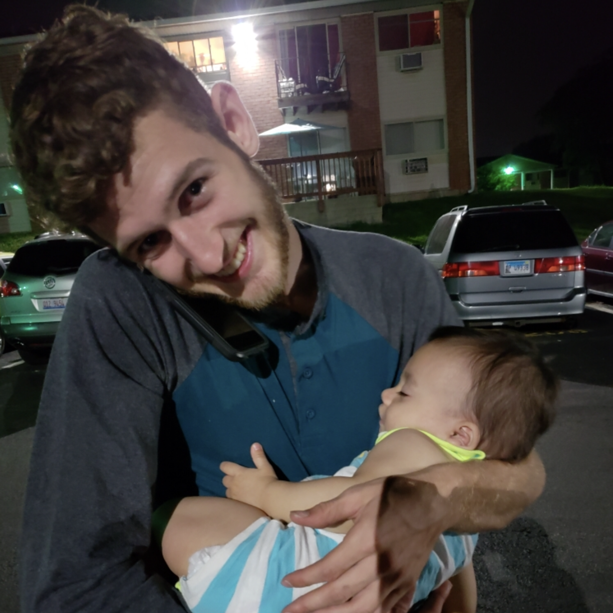 Speaking to each other while Noah slept in Josh's arms.