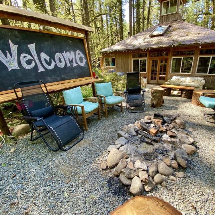 An outdoor seating area with fire pit near the communal lodge! Near this area we will have our wedding dinner and dancing after.