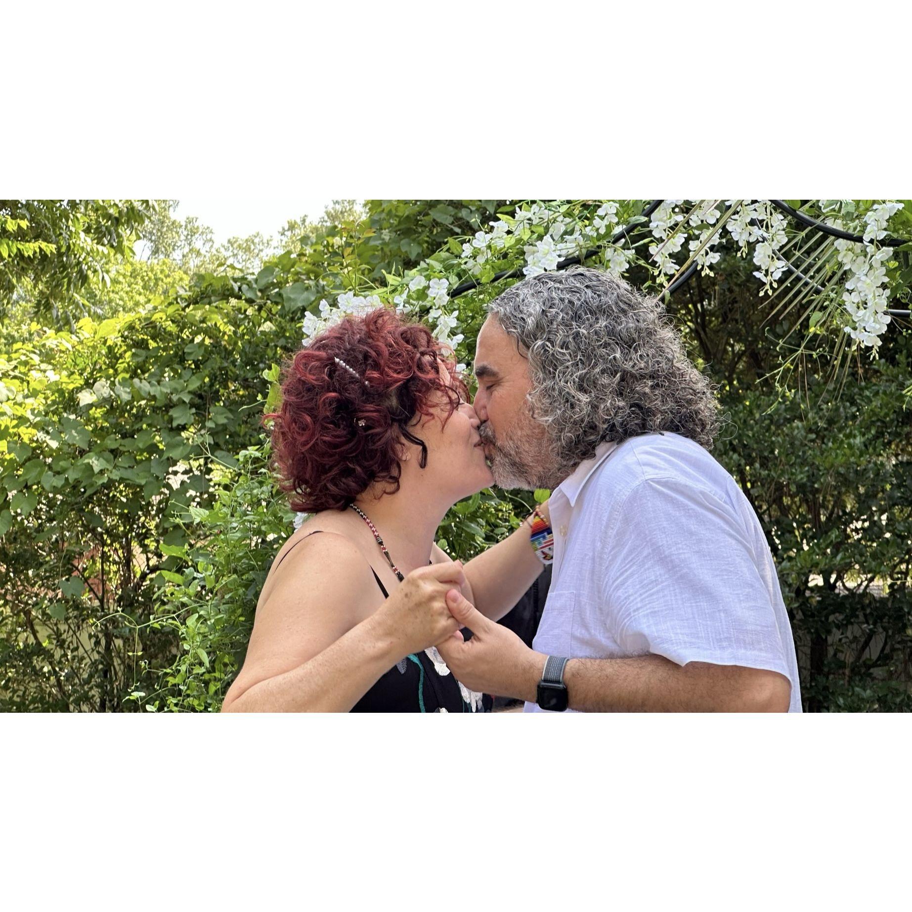 Finally, the bride gets a kiss.