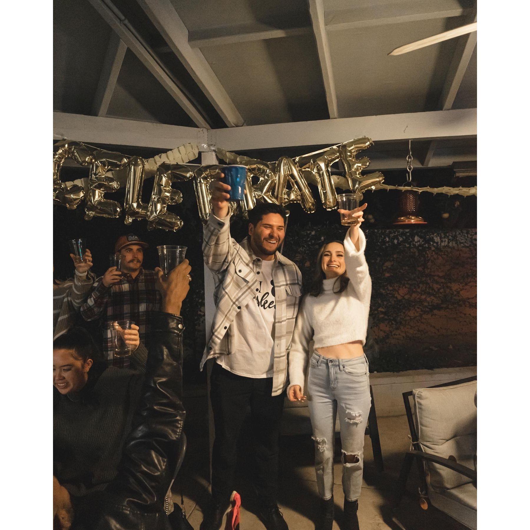 Celebrating at our engagement party that was a surprise to Emily!