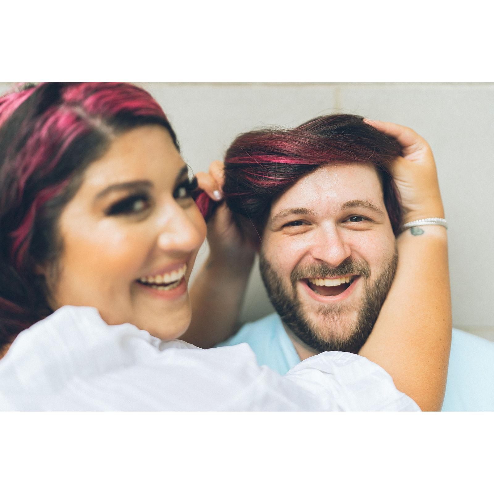 I say that he gets a pink and black hair piece.