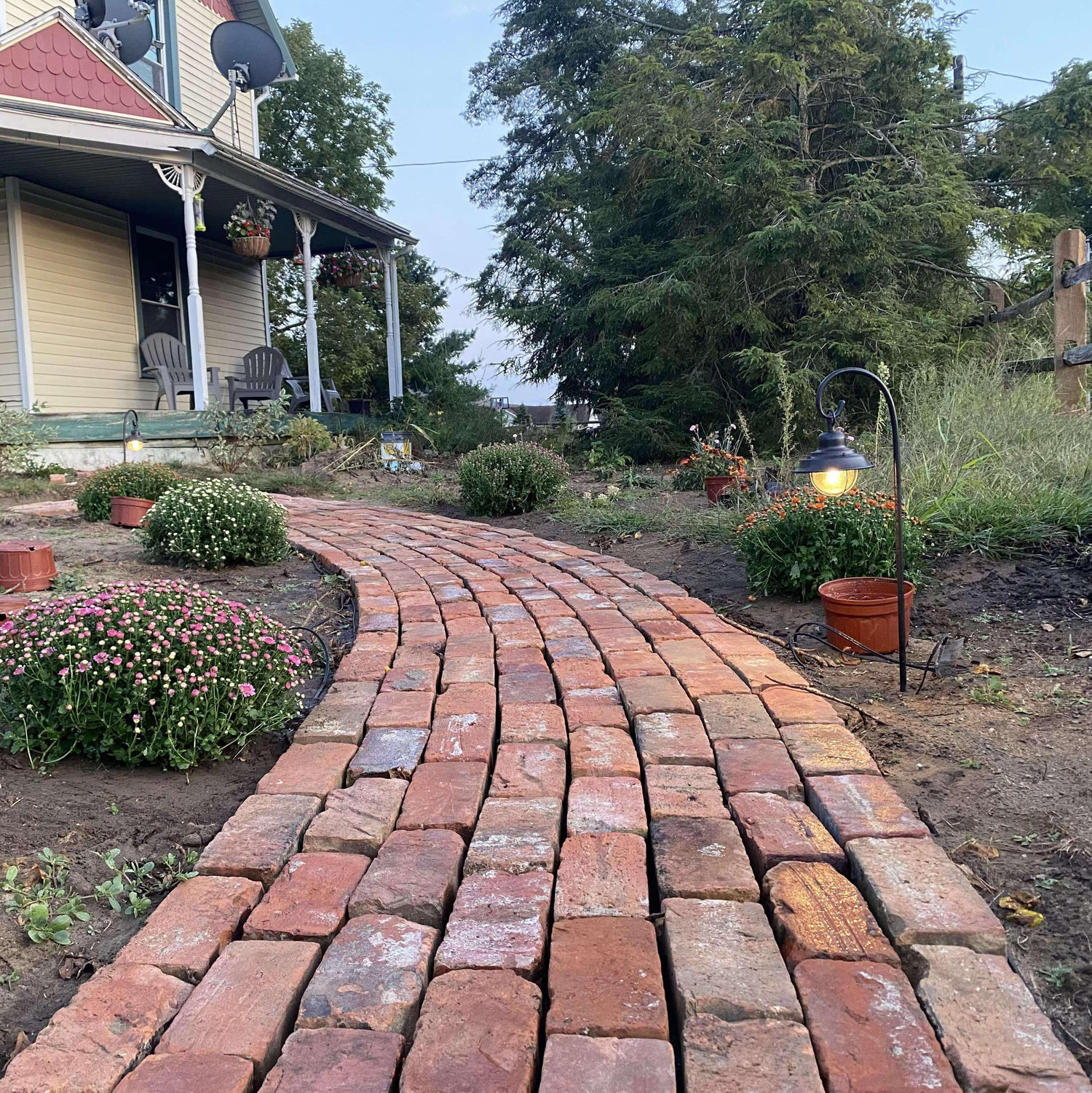 Gorgeous antique brick walkway Tyler has installed!