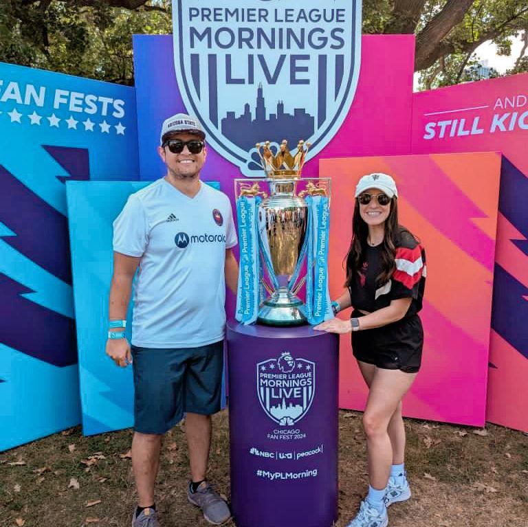 With the Premier League trophy!