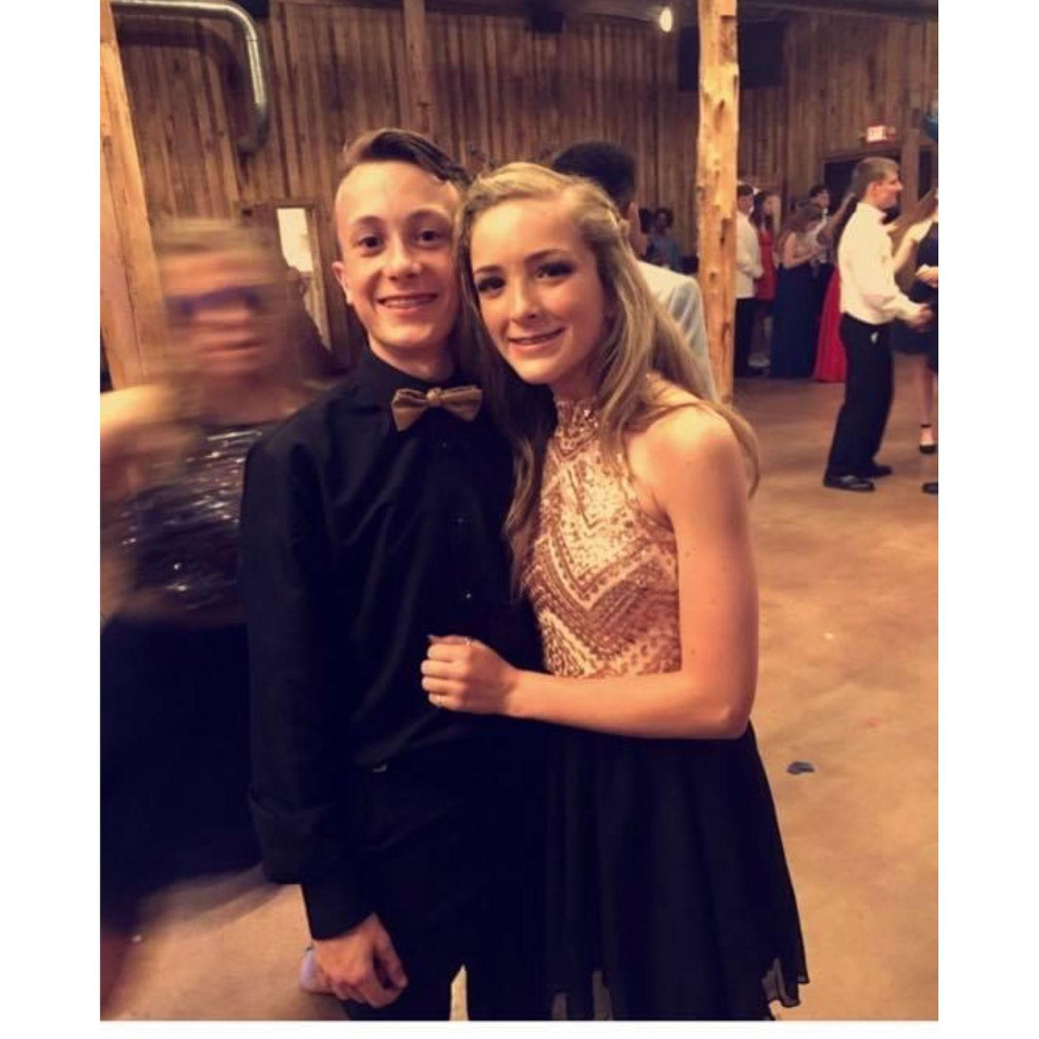 Us, at the 8th grade formal in 2017—just two kids having a good time, and nervous to take this picture