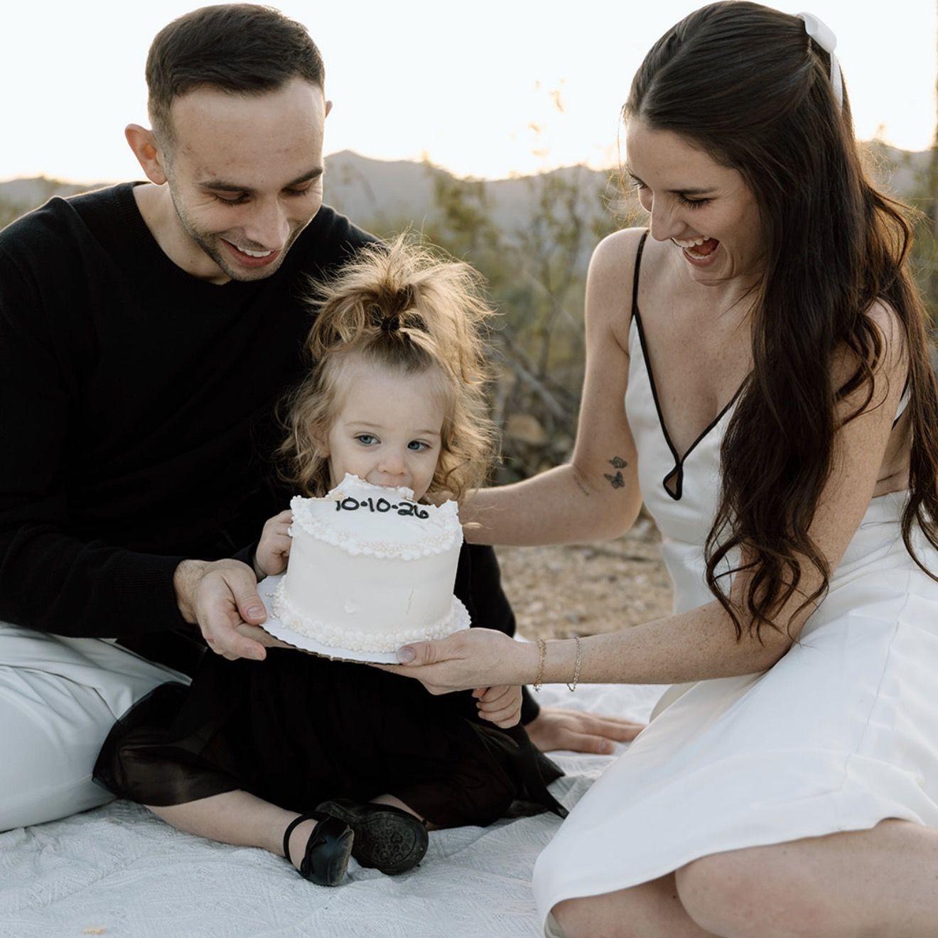 Evelyn is so excited to be the flower girl... or at least to eat the wedding cake.