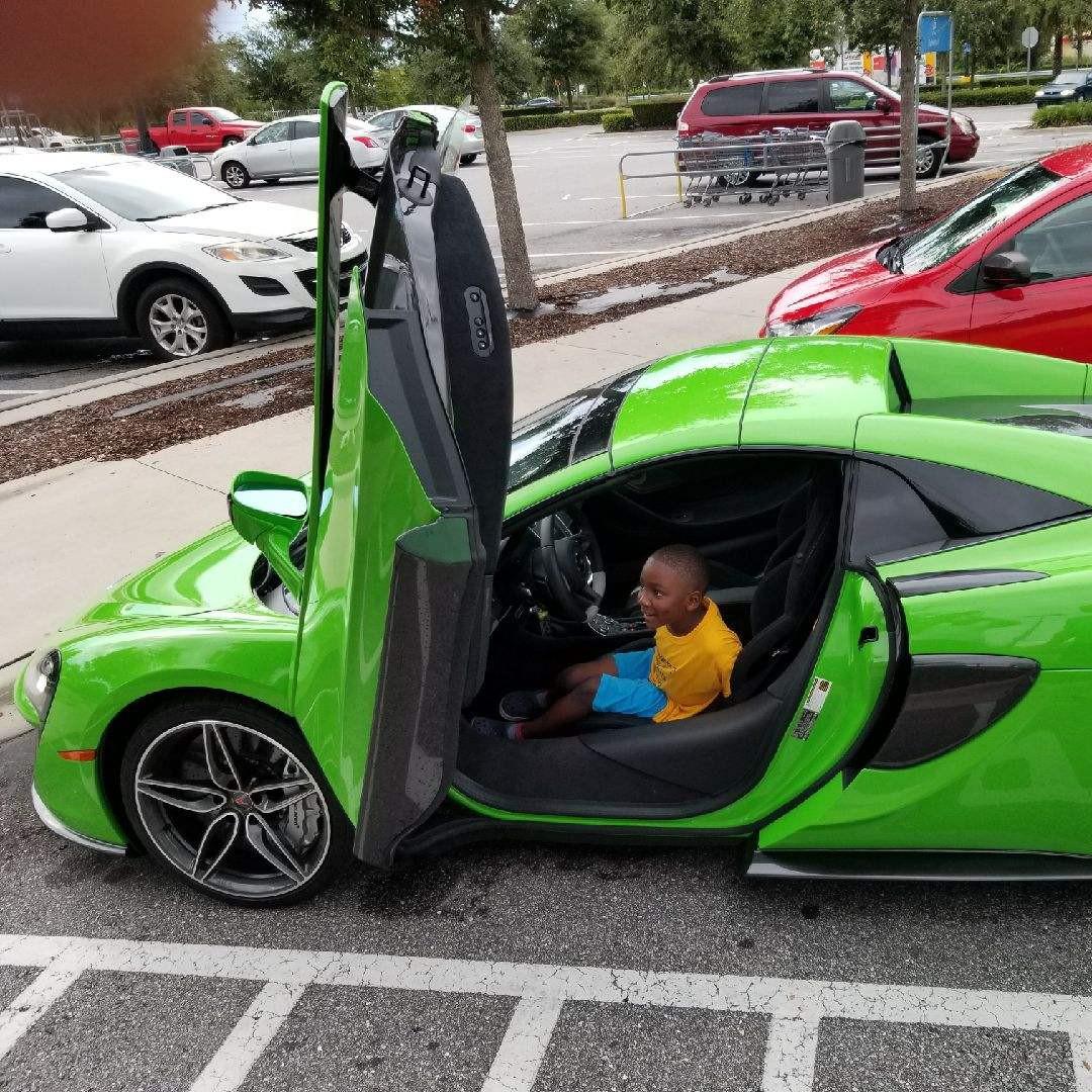 The Green Machine: Bryce loves the color Green & cars just like any other boy. But to see a fancy Green car, he stopped in tracks! His face lit up when the owner asked if he'd like to sit in it!