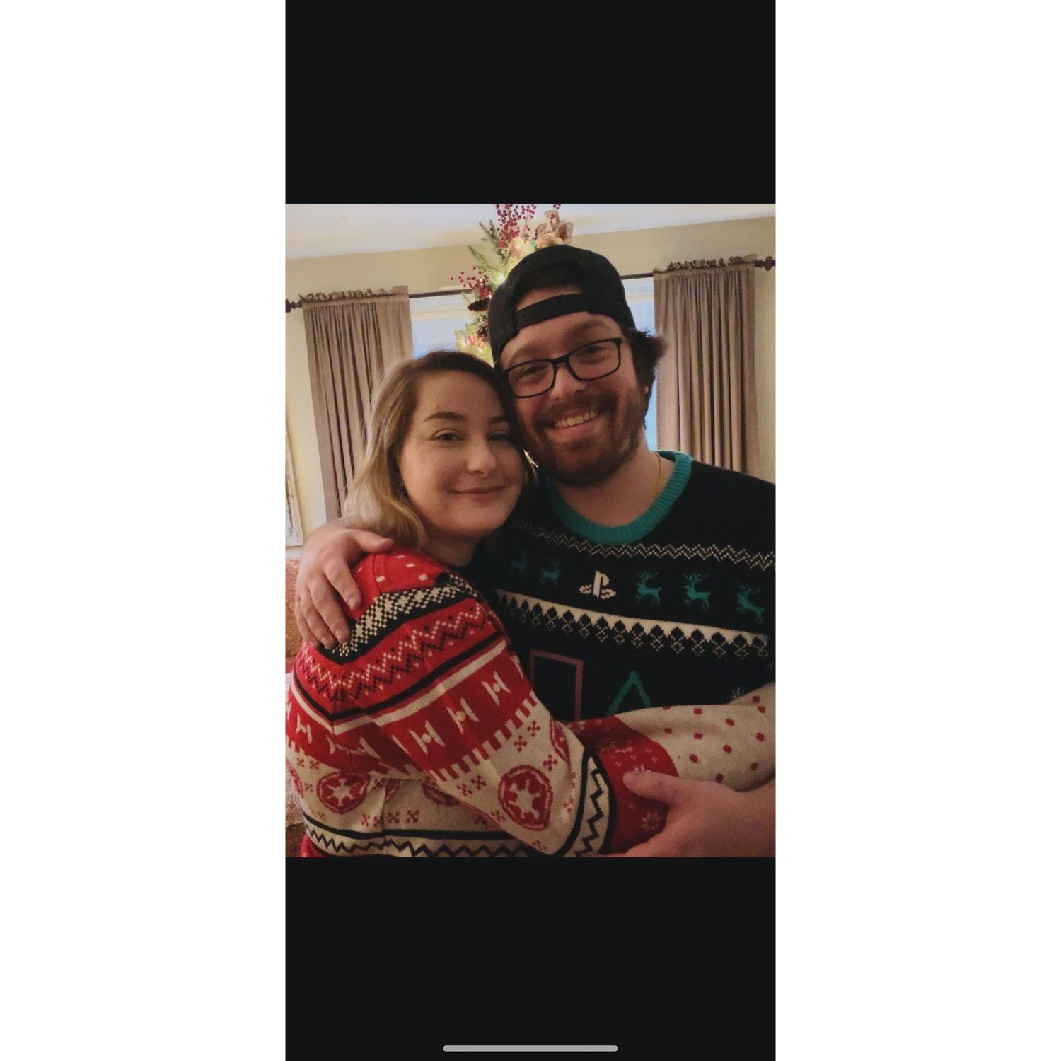 Our first Christmas together. To this day Matt says that is one of his favorite photos of us