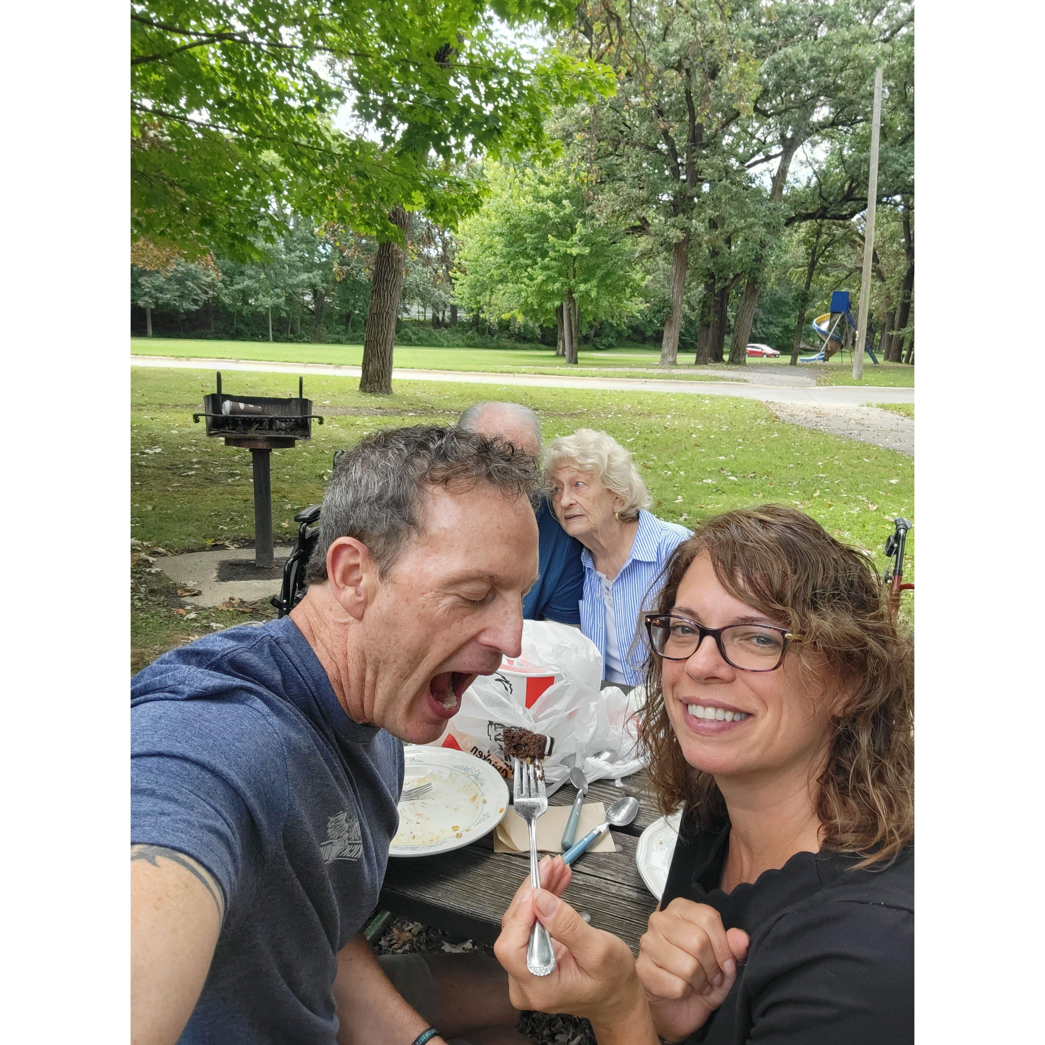 August 30, 2024. Like mother, like son! Loving our monthly picnics in the park with parents and poke cake.