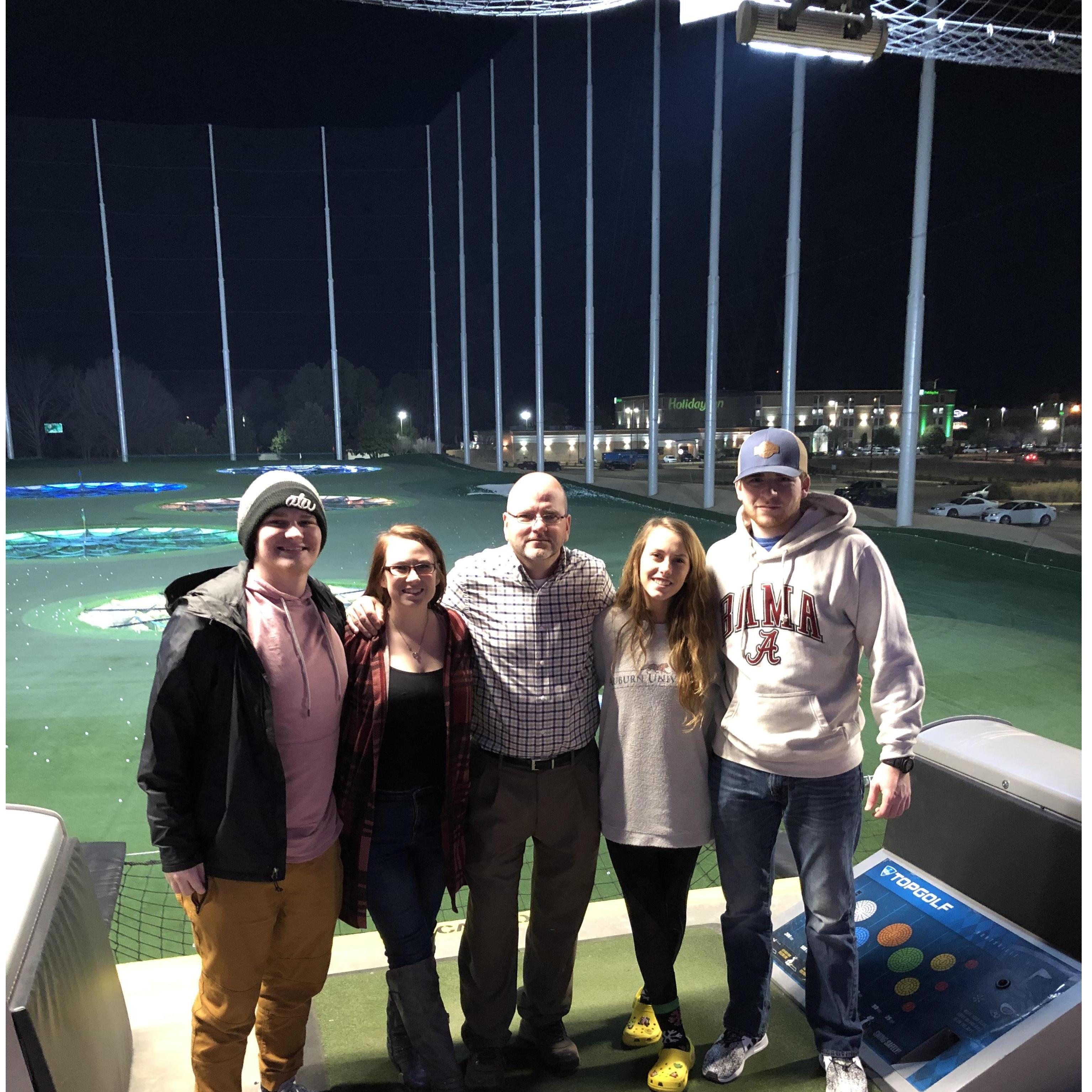Austin and Dad love to golf together so a family trip to Top Golf makes it so much better!