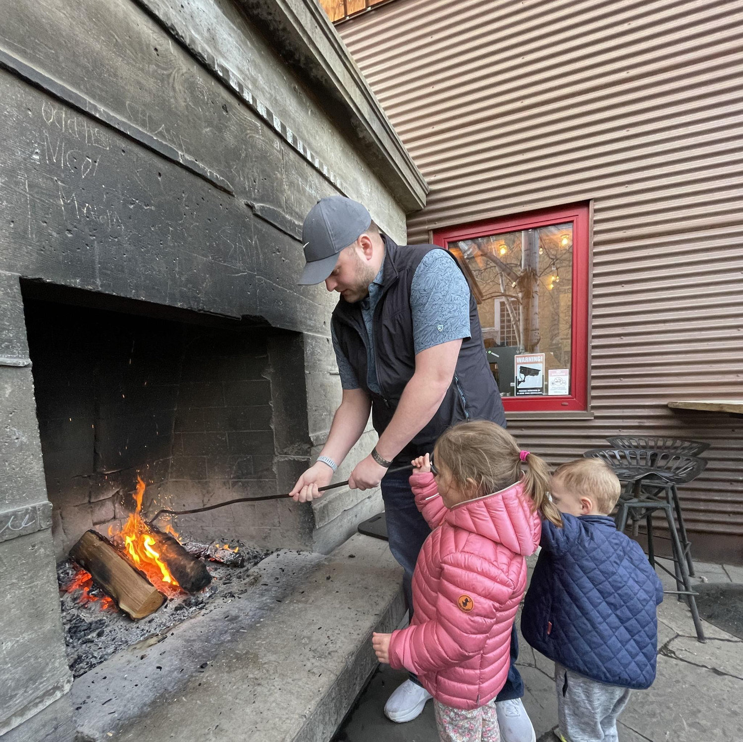 Tyson showing Nora and Parker his favorite thing to do at the Ciderhouse in Bozeman!