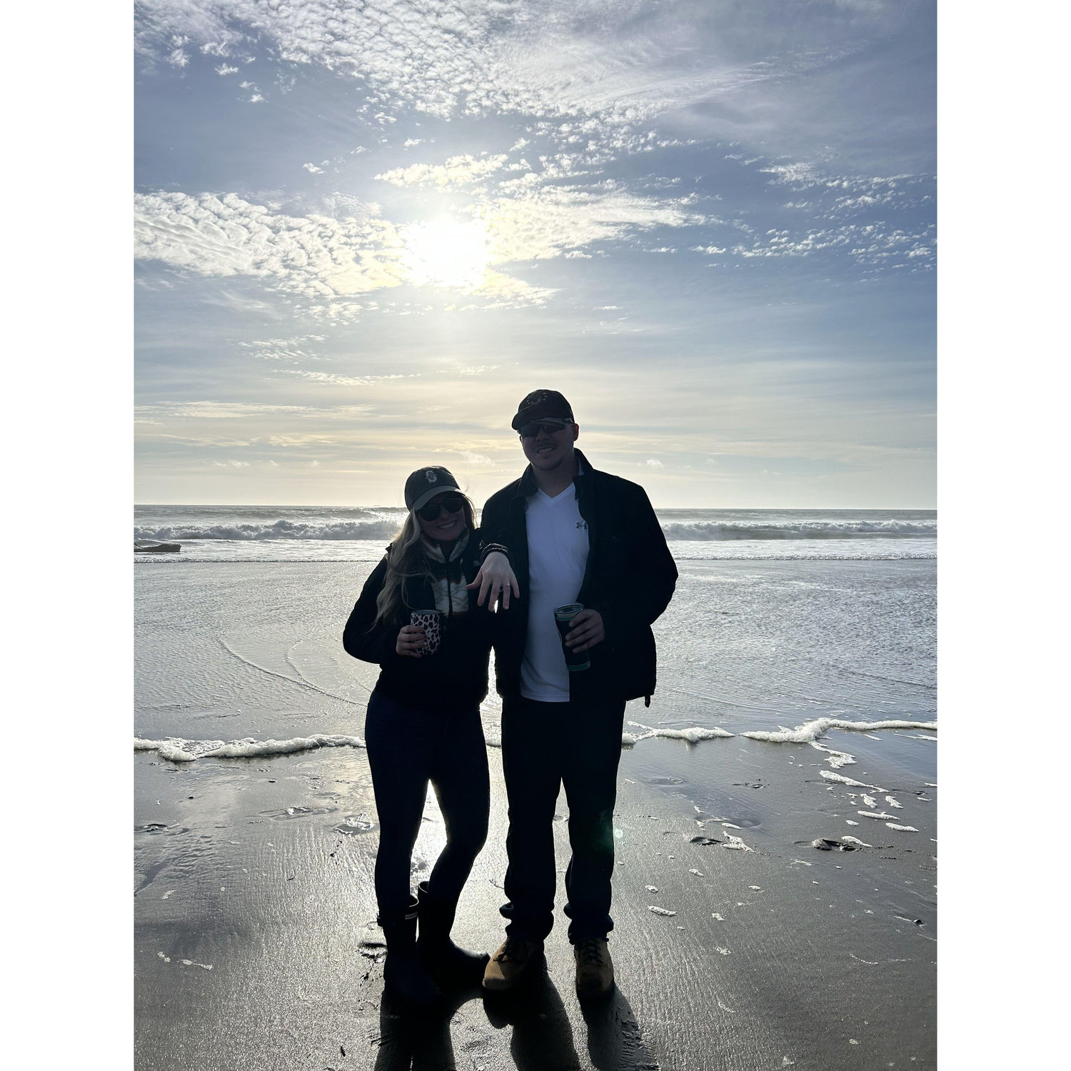 This photo was taken right after Jessica and Zac got engaged in Lincoln City, Oregon on June 8th, 2024.