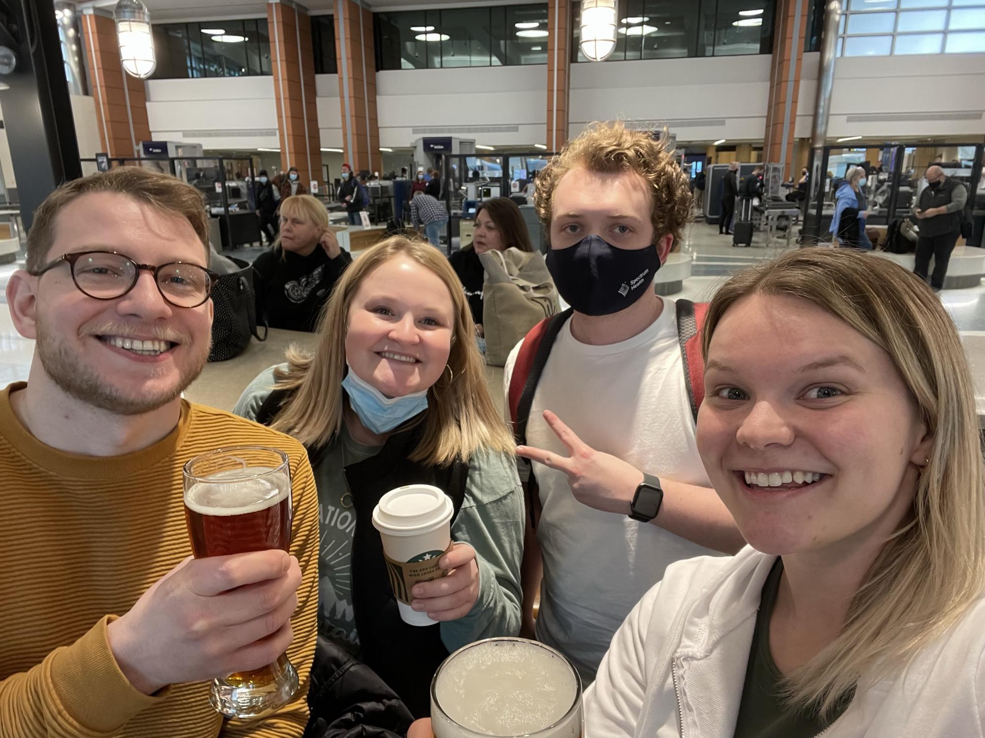 Us and Cassidy and Matt in the airport waiting for our flight to Orlando