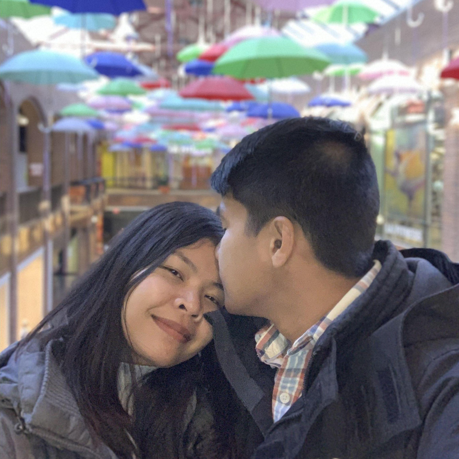 Underneath many umbrellas, there is us.