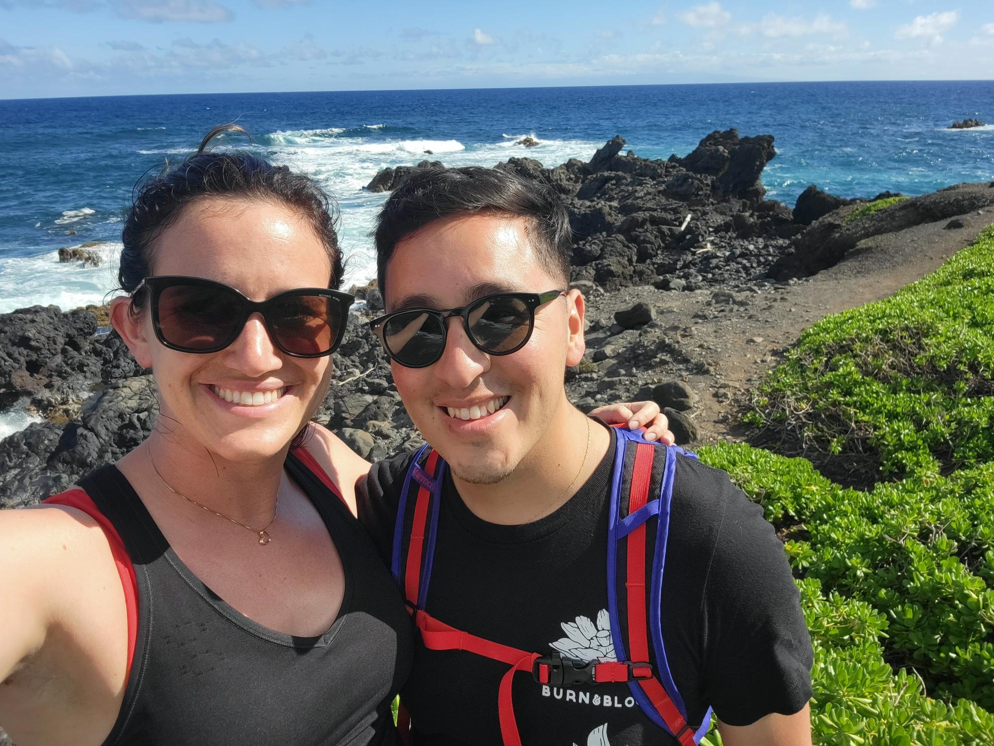 Admiring the black rocks on Maui, HI.