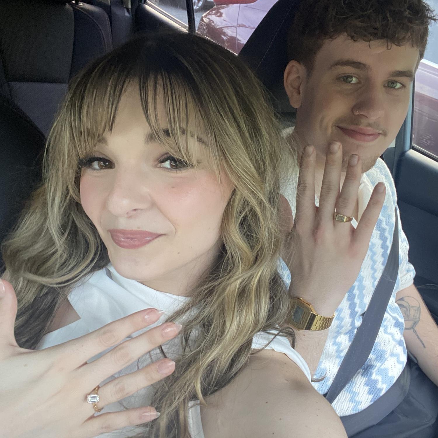 both of our engagement rings <3