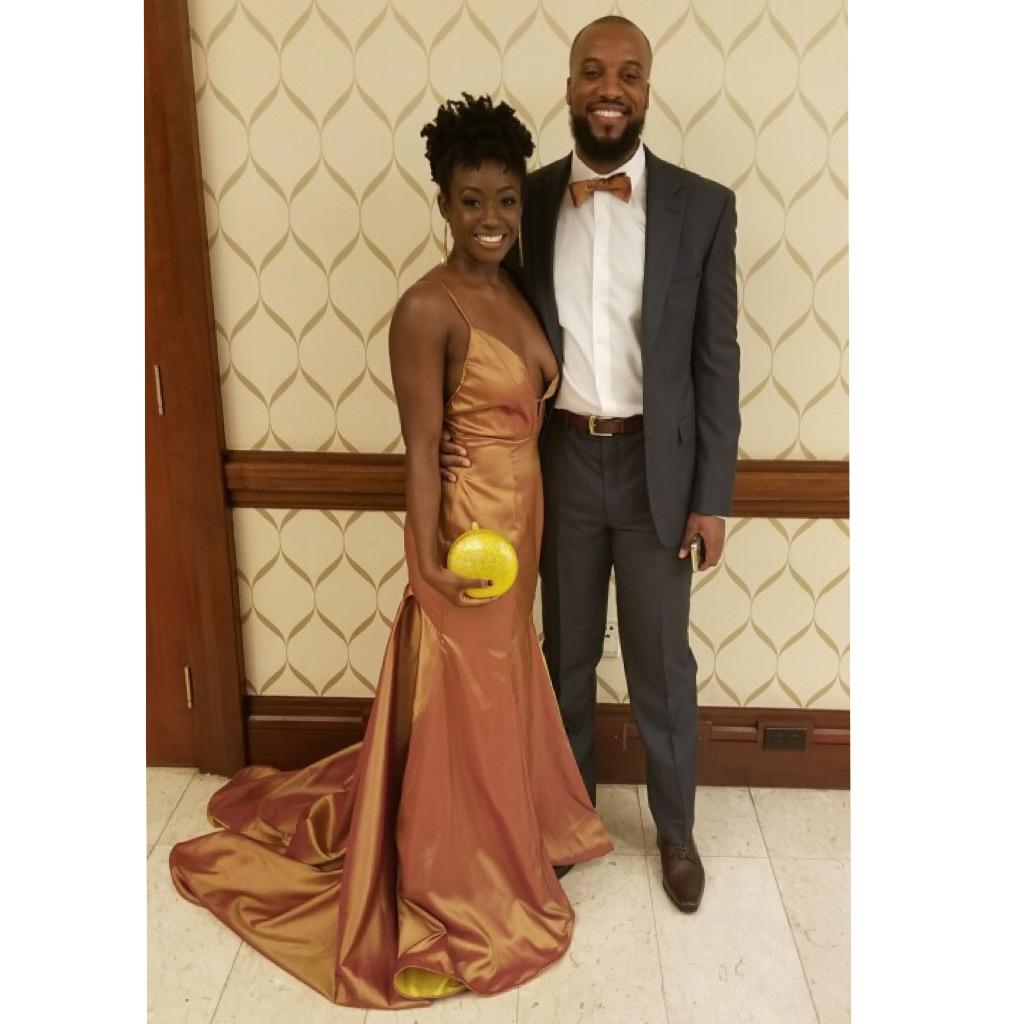 Ebony Winter Gala 2018. My mom made my dress and I made his bow tie.