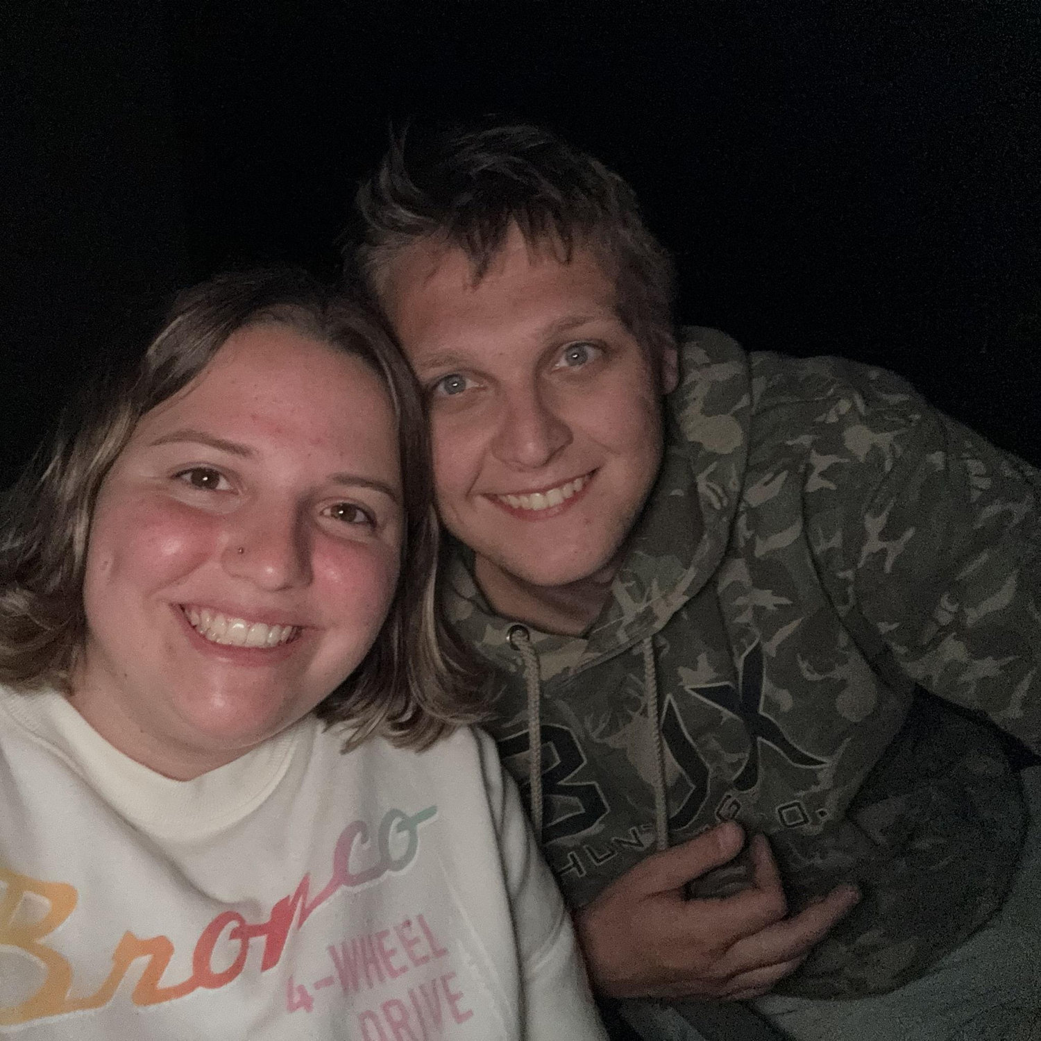 Up north at the lake, sitting by the fire.