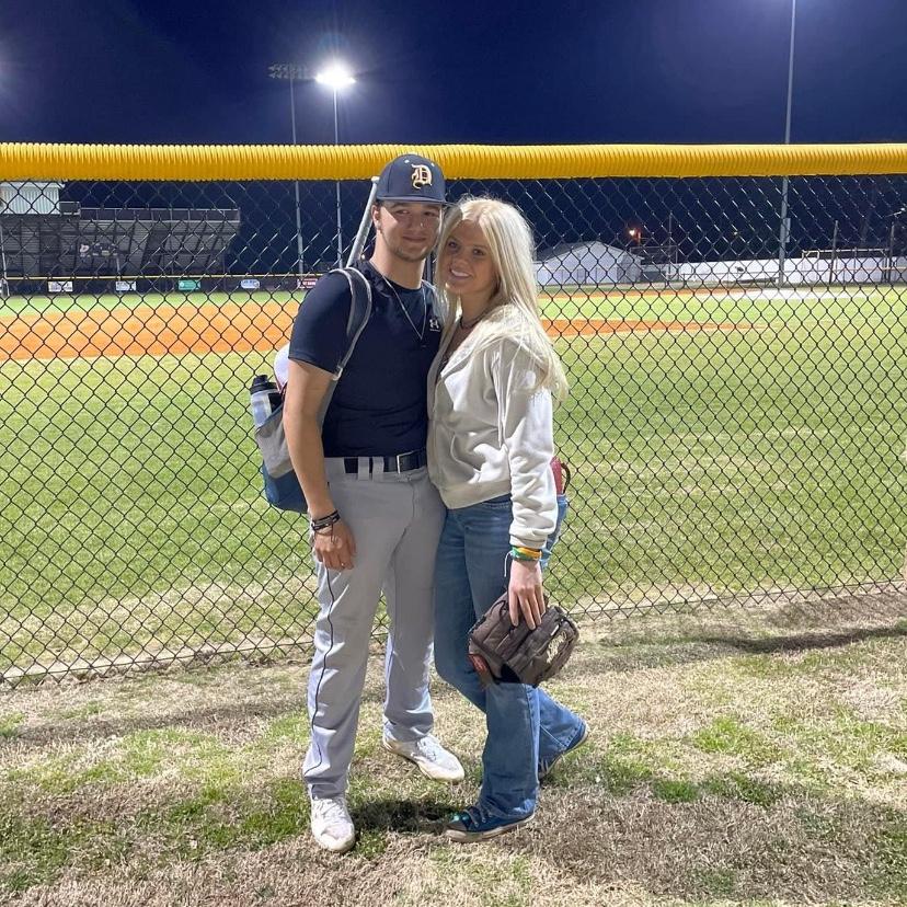 Ava supporting Darren at one of his highschool baseball games