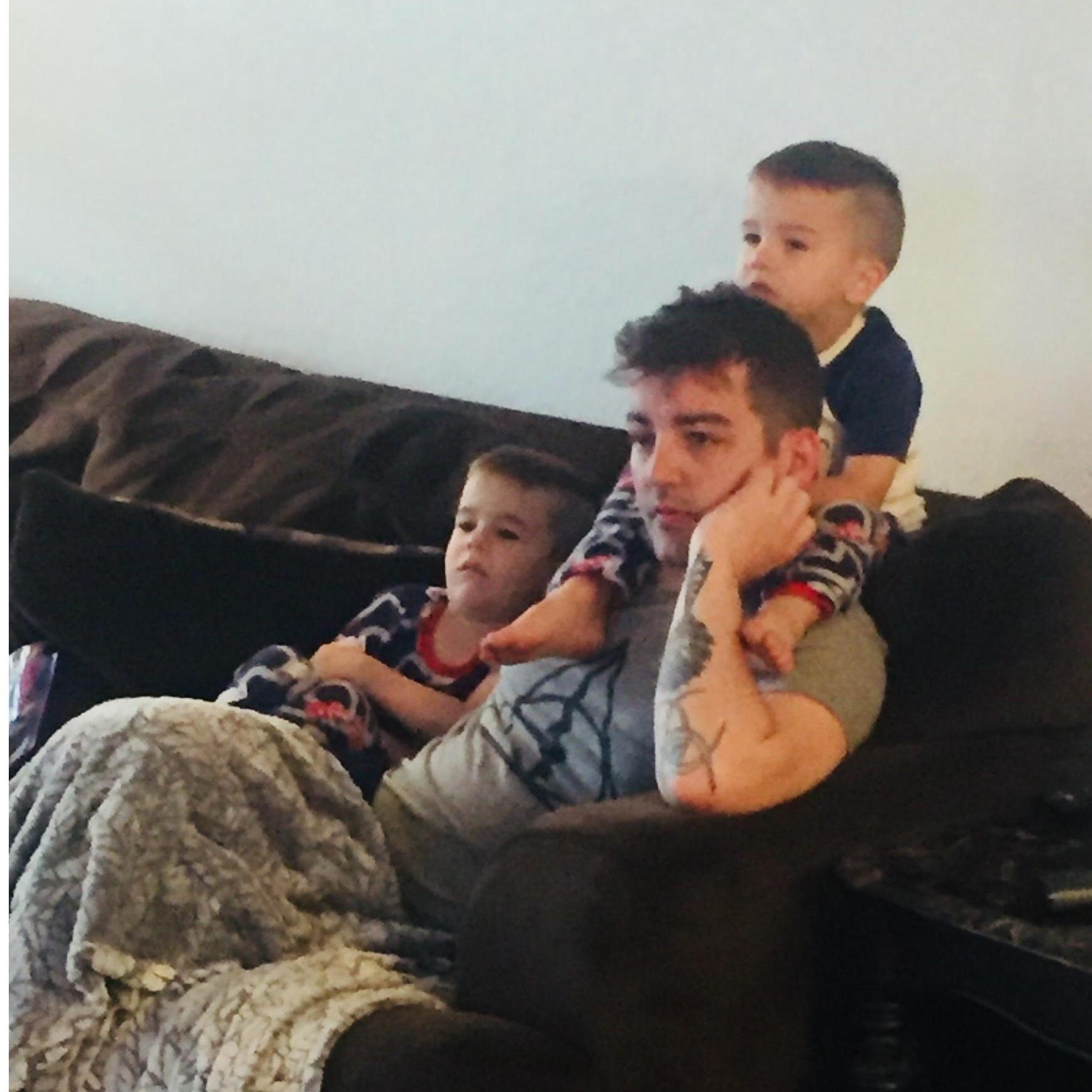Aaron with the Templeton Ring Bearers enjoying some morning cartoons.