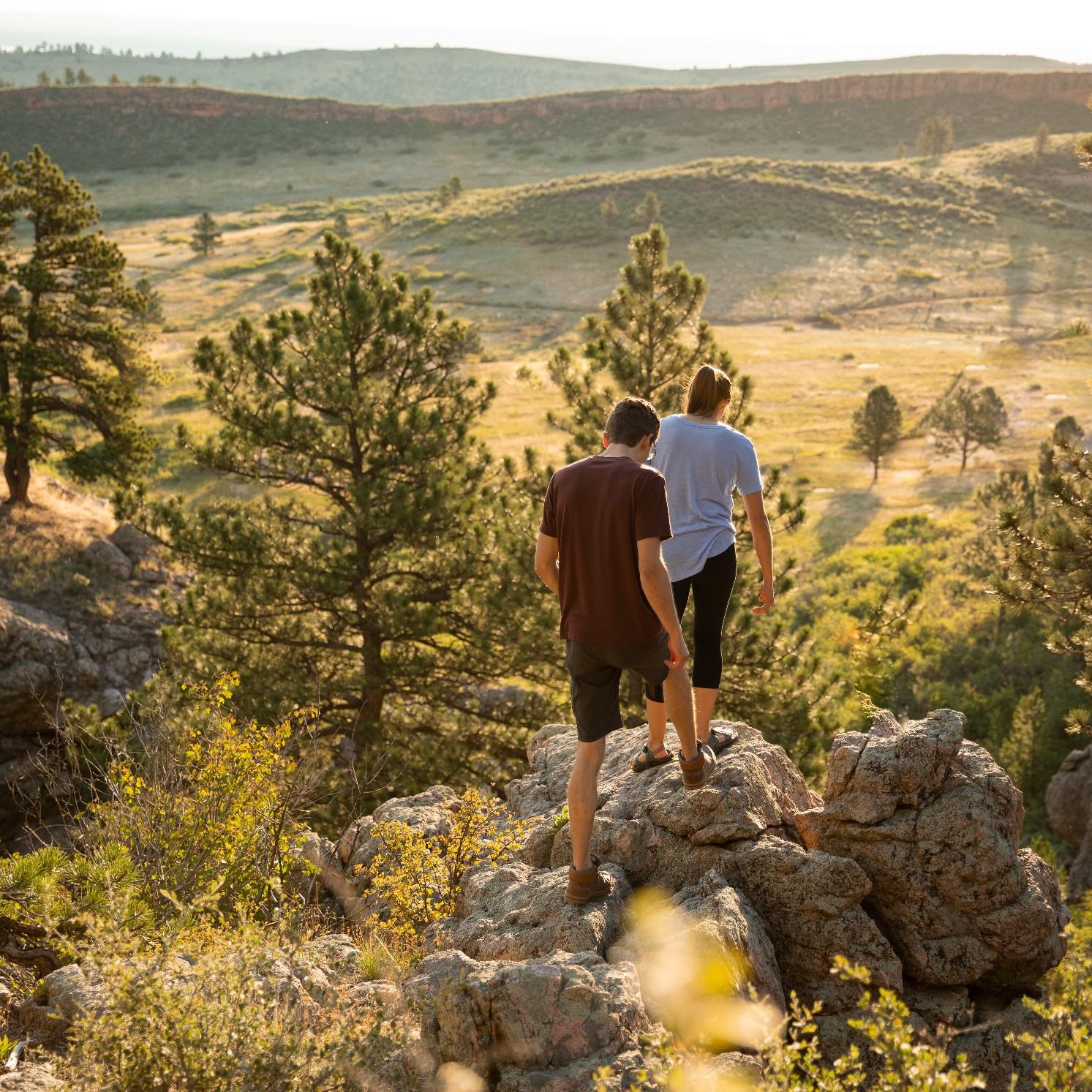 Engagement pictures while hiking Arthur's Rock in Fort Collins.