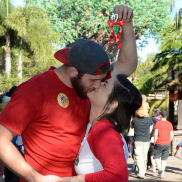 Danny's first time in Disney World and our first mistletoe kiss
