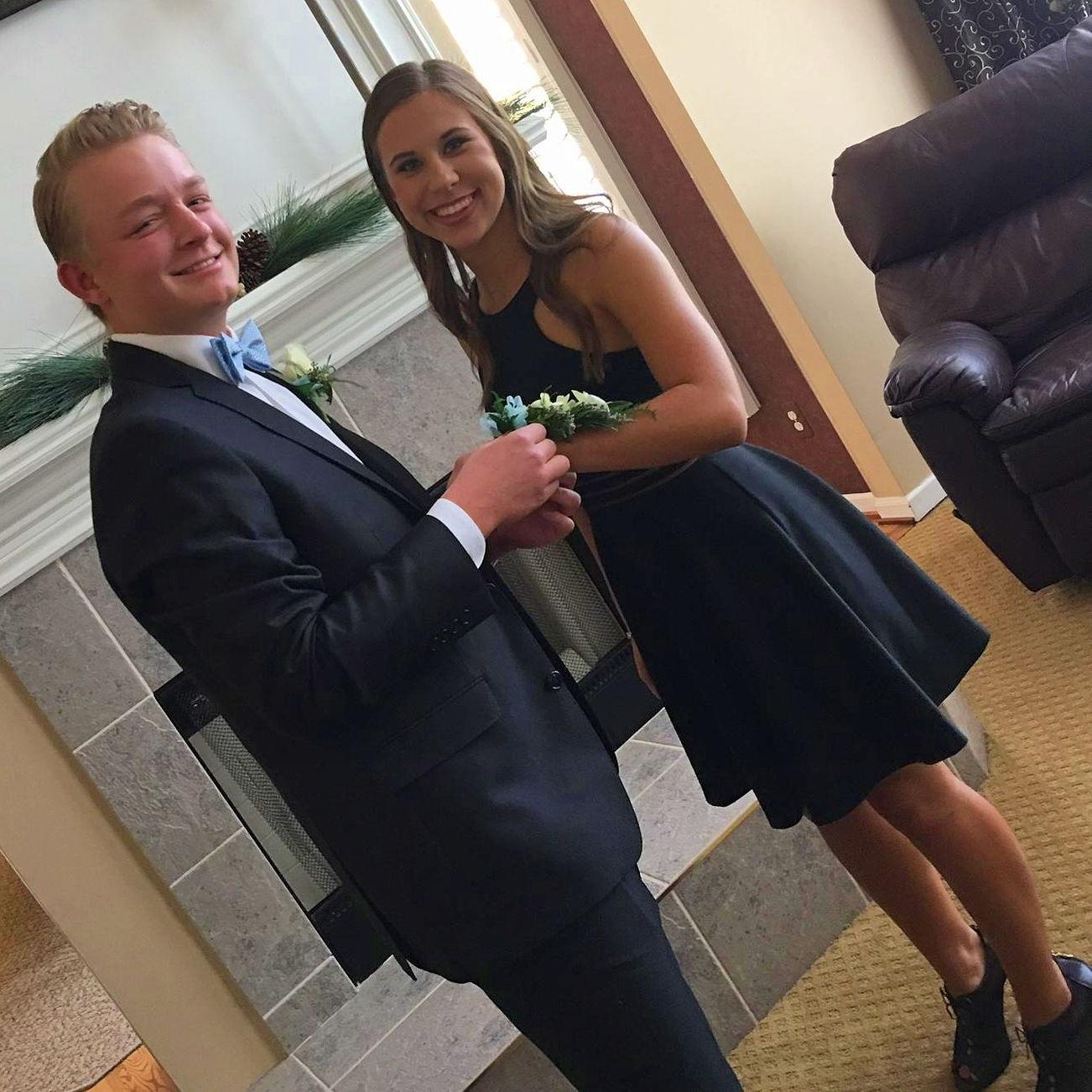 Our first ever picture taken together at our Senior Year Homecoming.