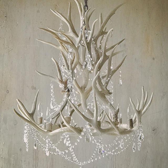 Antler Chandelier, hand crafted from real antlers adorned with authentic leaded crystals.