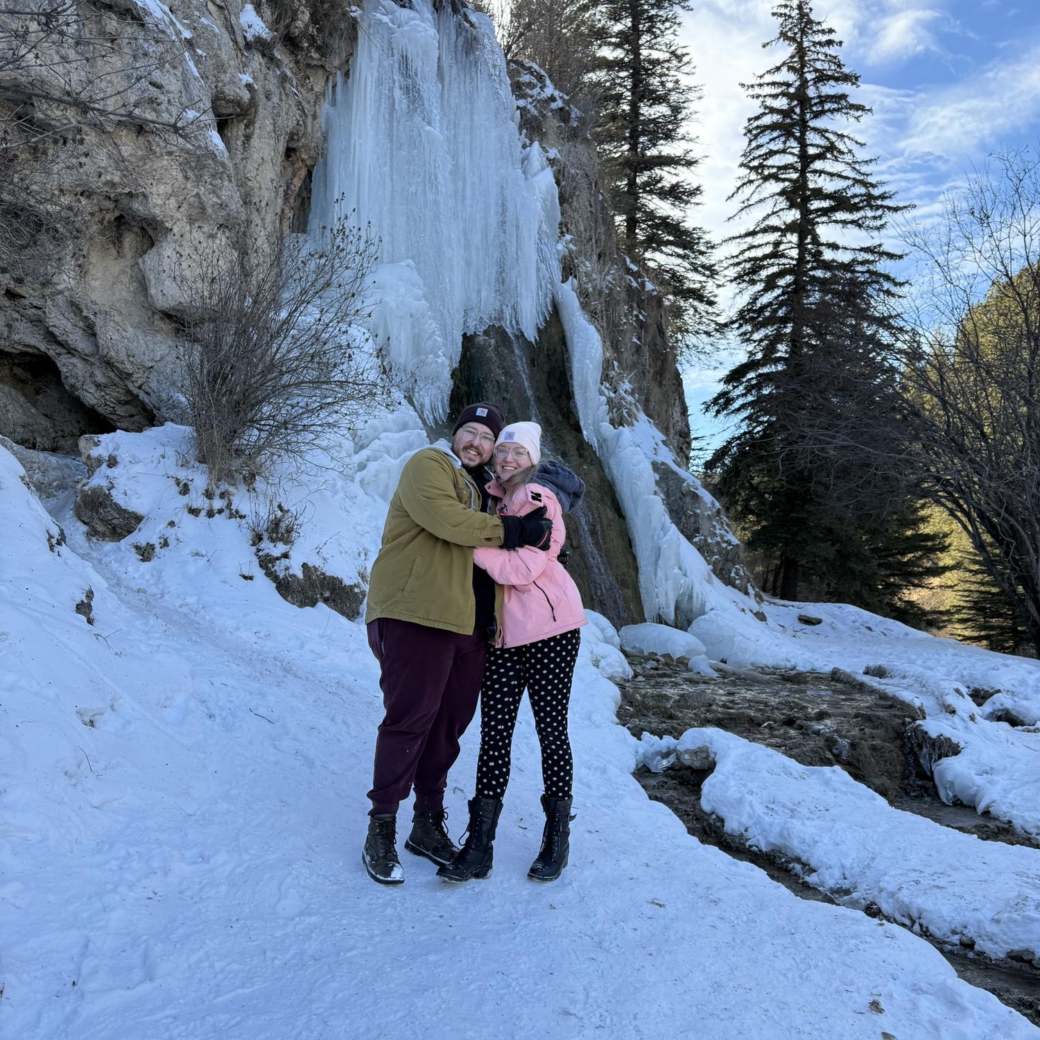 Standing in front of a frozen waterfall in NM.