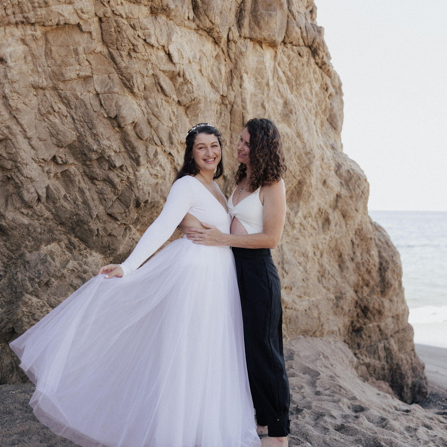 In October 2025, exactly a year before this reception, we officially said forever to each other at an intimate oceanside ceremony and paddle out