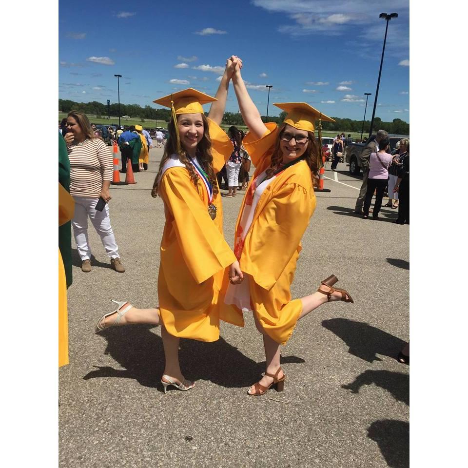 (2019) Abby and Julia's traditional pose at high school graduation