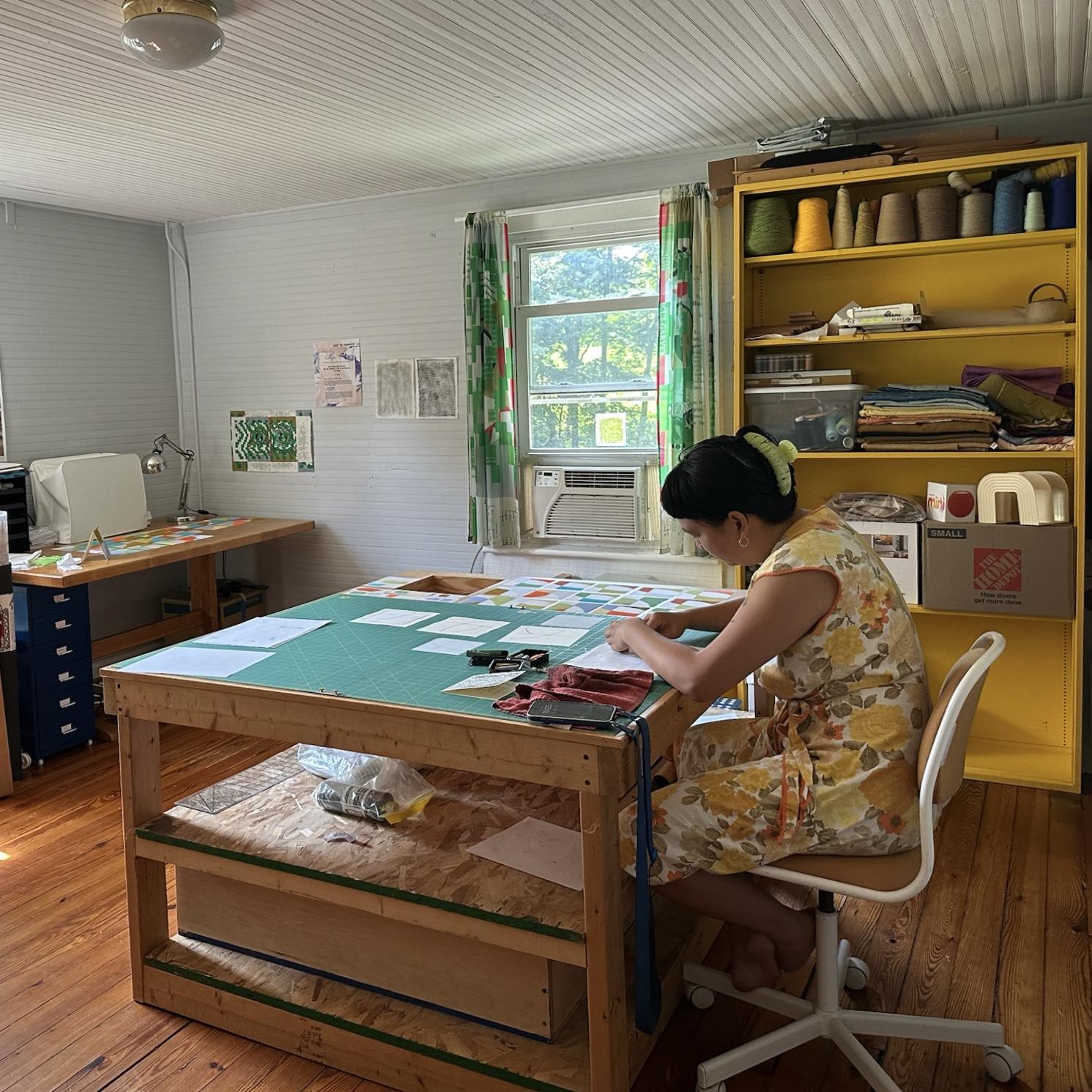 In our shared home studio making our wedding invitations