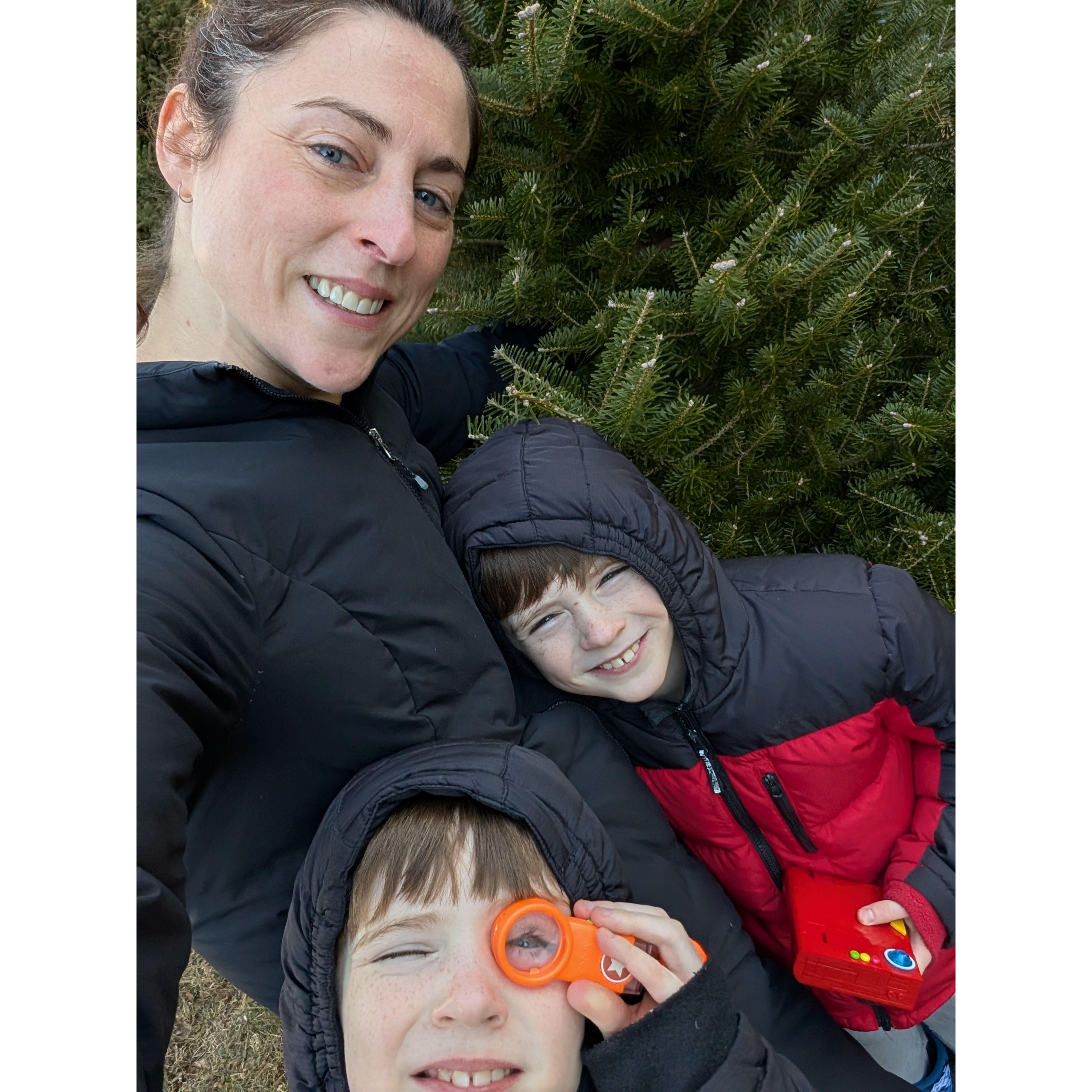 Cutting down our first family Christmas tree - Charlie assessed each possible tree with his Pokedex, and Luke checked the pine needle integrity with his magnifying glass.