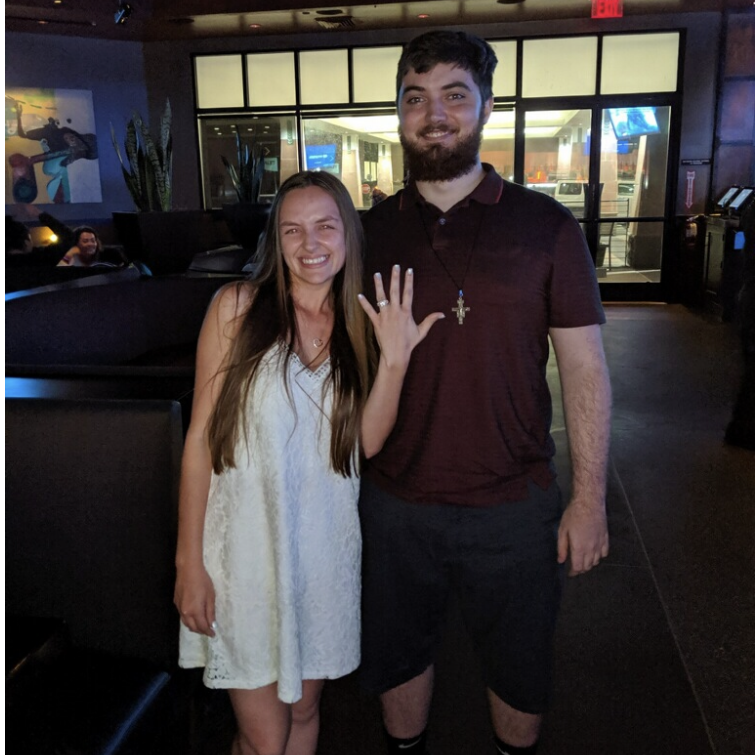 In this photo, we were celebrating our engagement that happened right before it was taken at The Yard House.