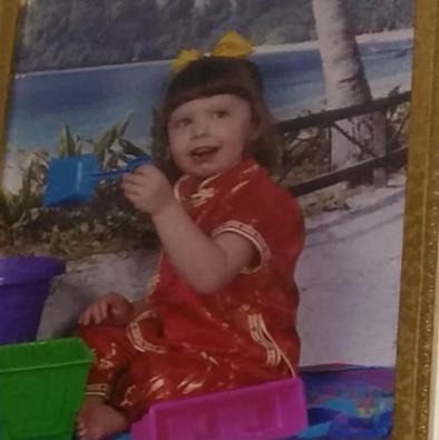 Old baby photo of the bride