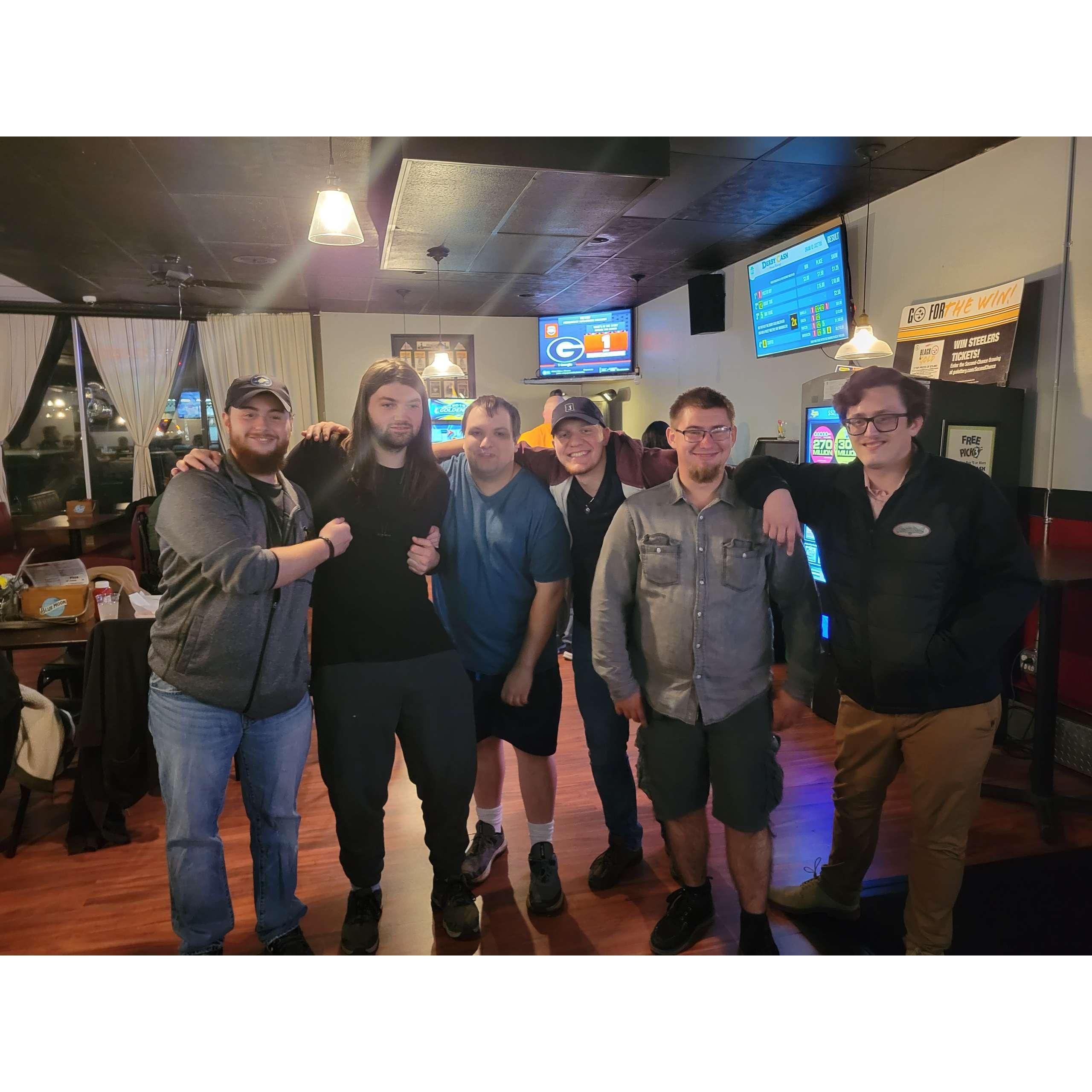 Matt and all of his groomsmen at his surprise 25th birthday party!