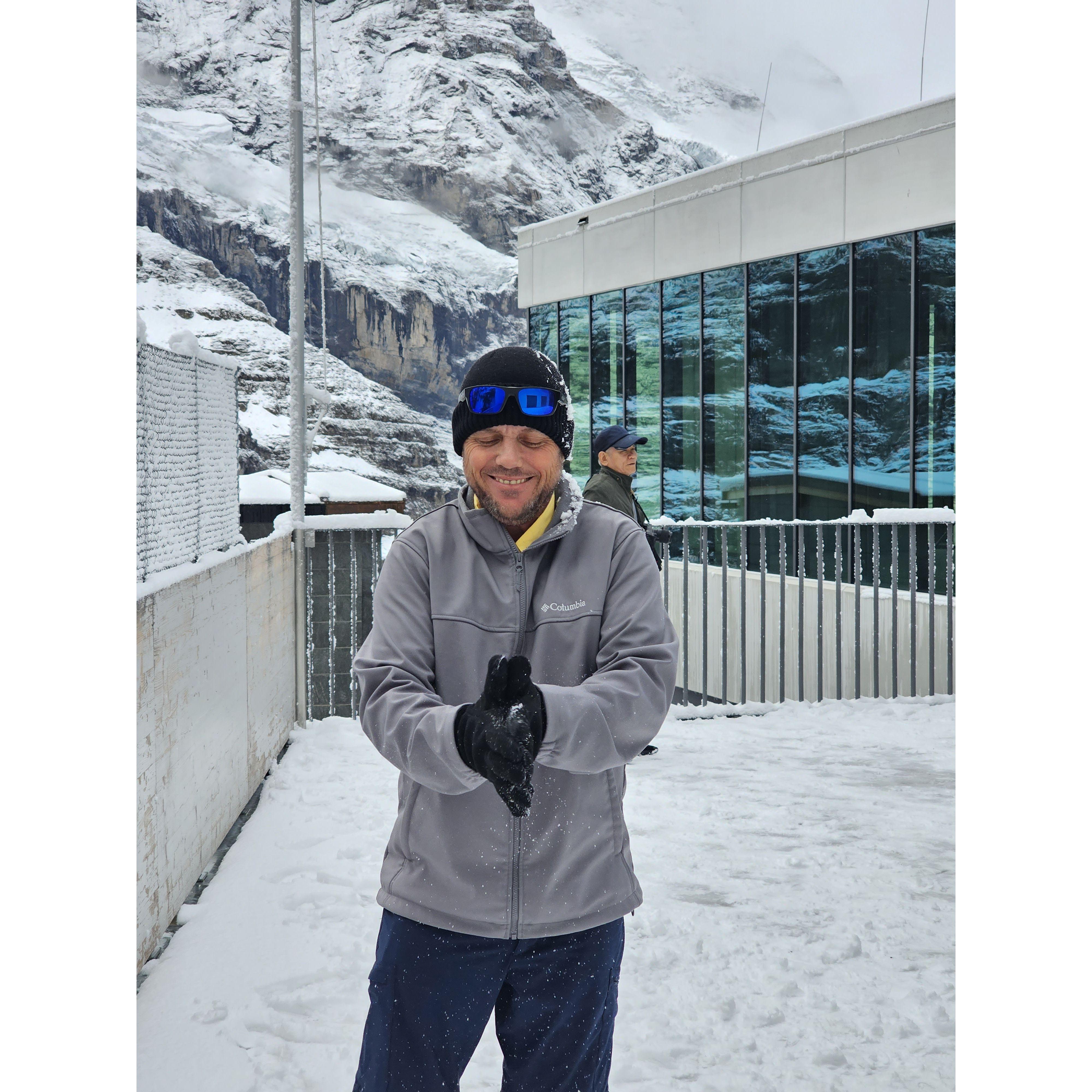 Snowball fight before leaving the mountain top