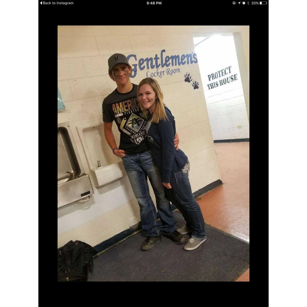 One of our first photos together. Right after a football game