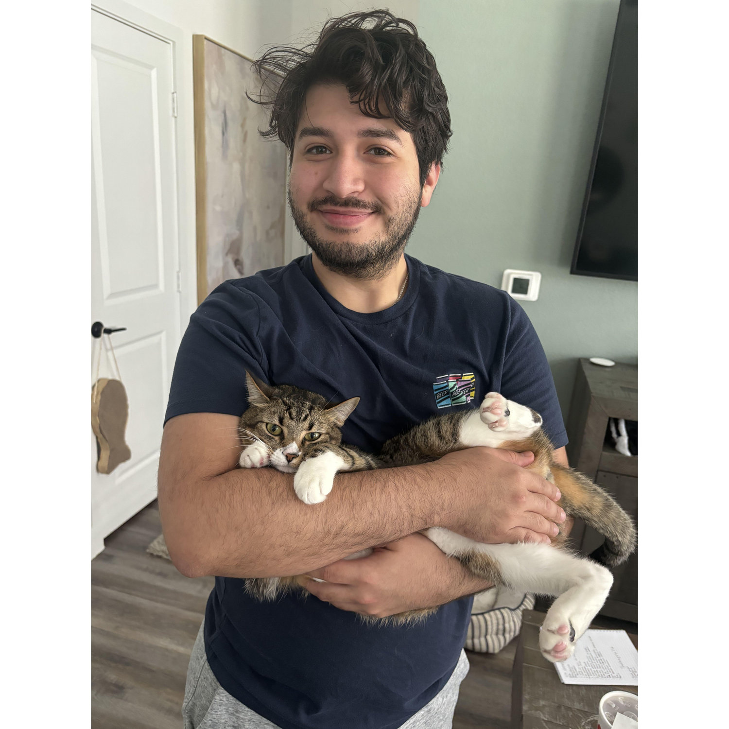 The first thing Joel does when he gets home from work is hug Leo, Me, and Winston... in that order.