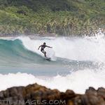 Surfing at Duli Beach