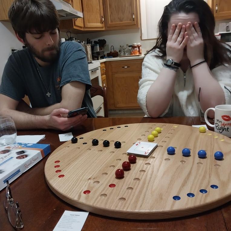 Here’s Monica, despairing because Keegen once again won at Carbles.