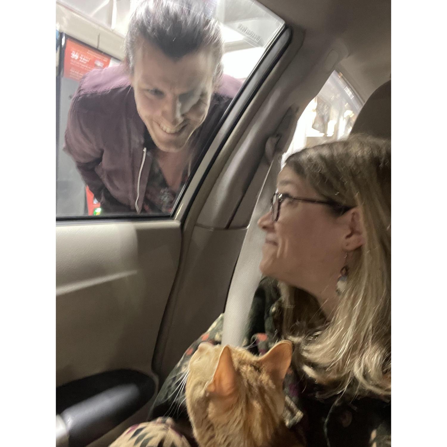 The cat pooped in the car