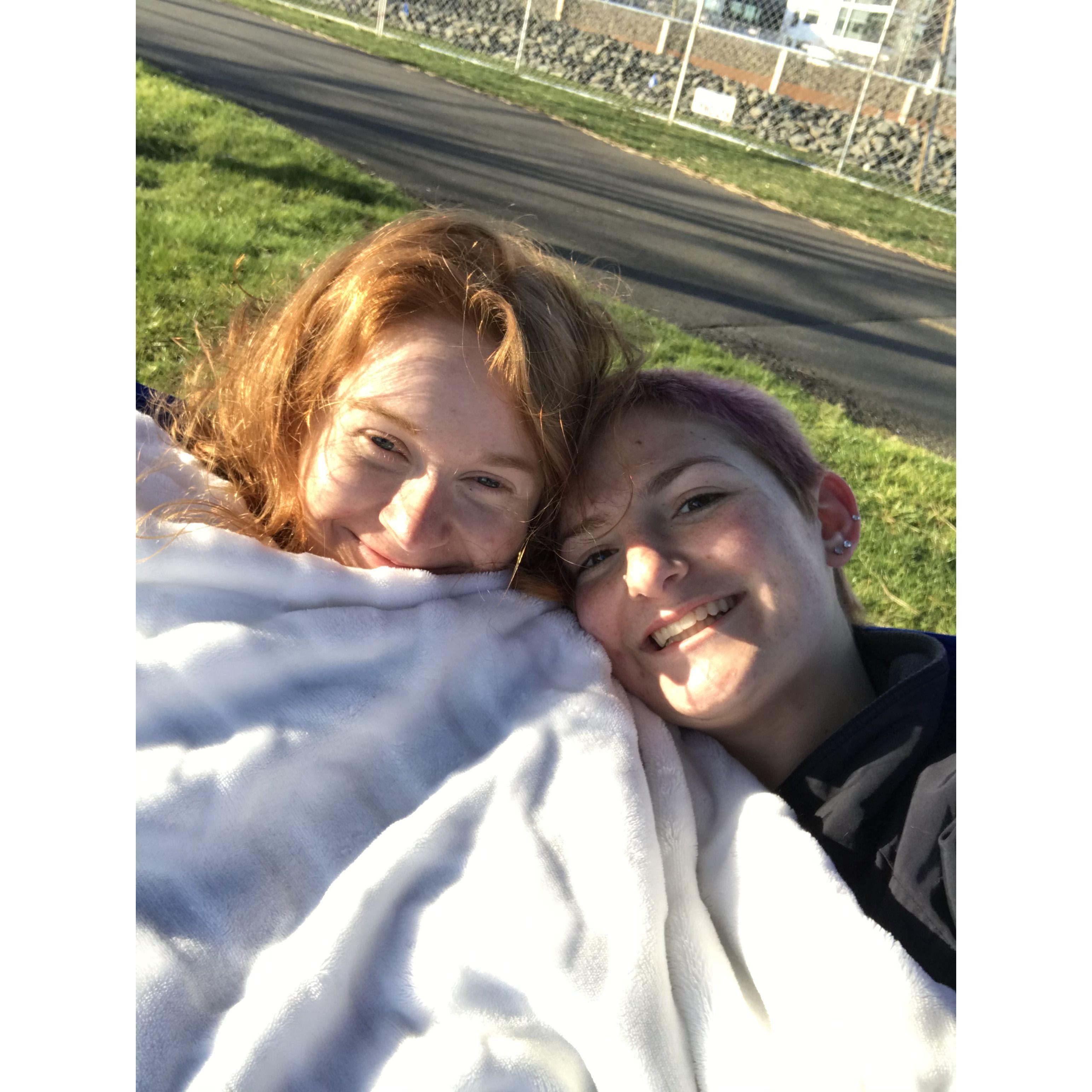 Our first photo together, hammocking in the park that Hannah later proposed to Casper in