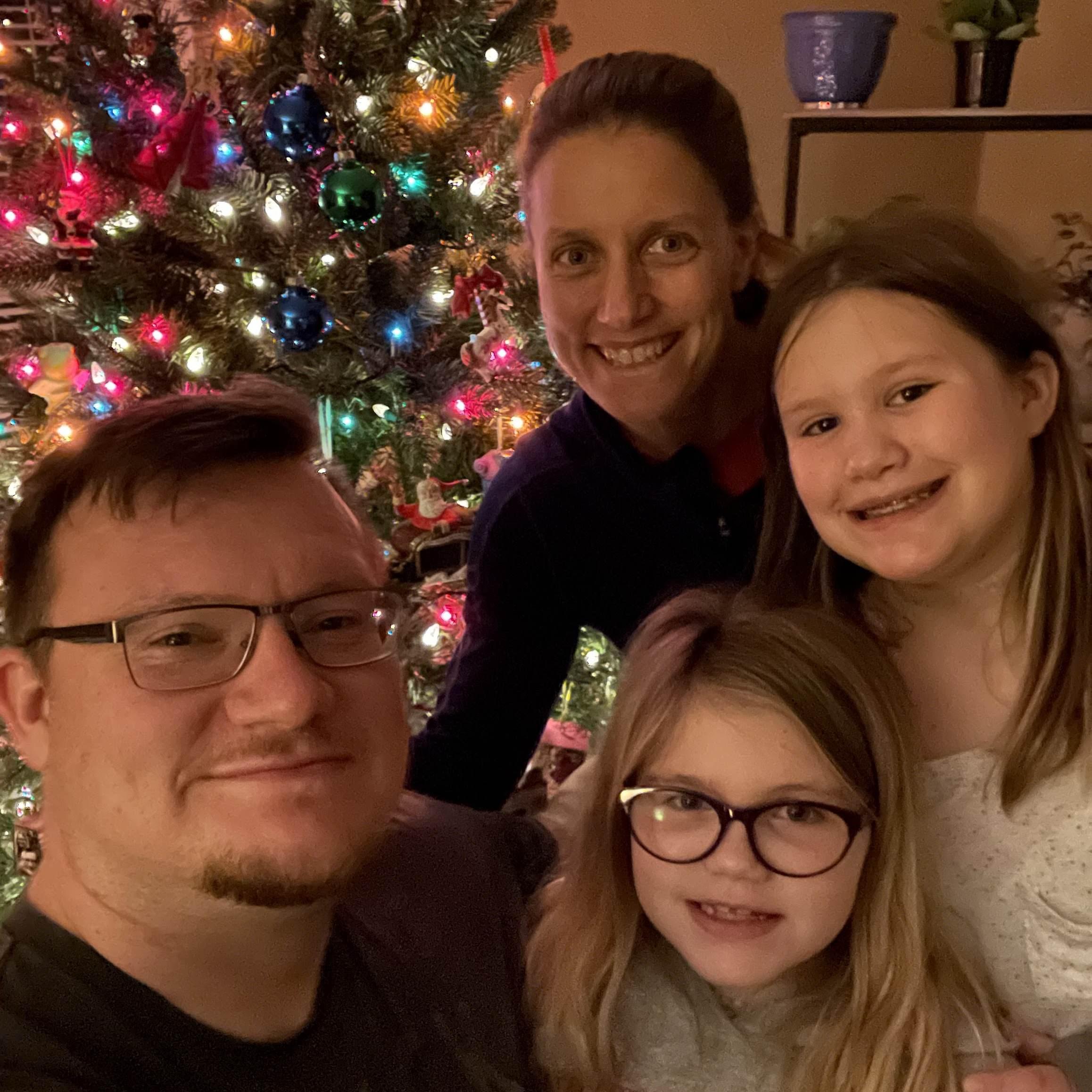 Decorating the Christmas tree all together this year!