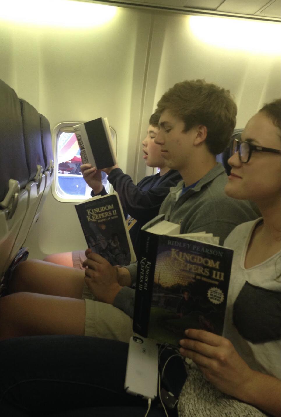 On the way to Disney World reading Kingdom Keepers (the book we bonded over) in Spring 2015